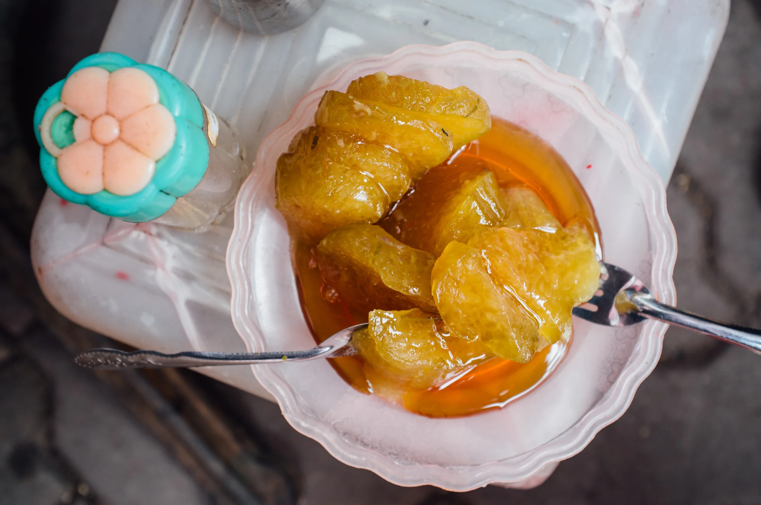Bánh gio , served with a thinned syrup of mật mía (molasses)