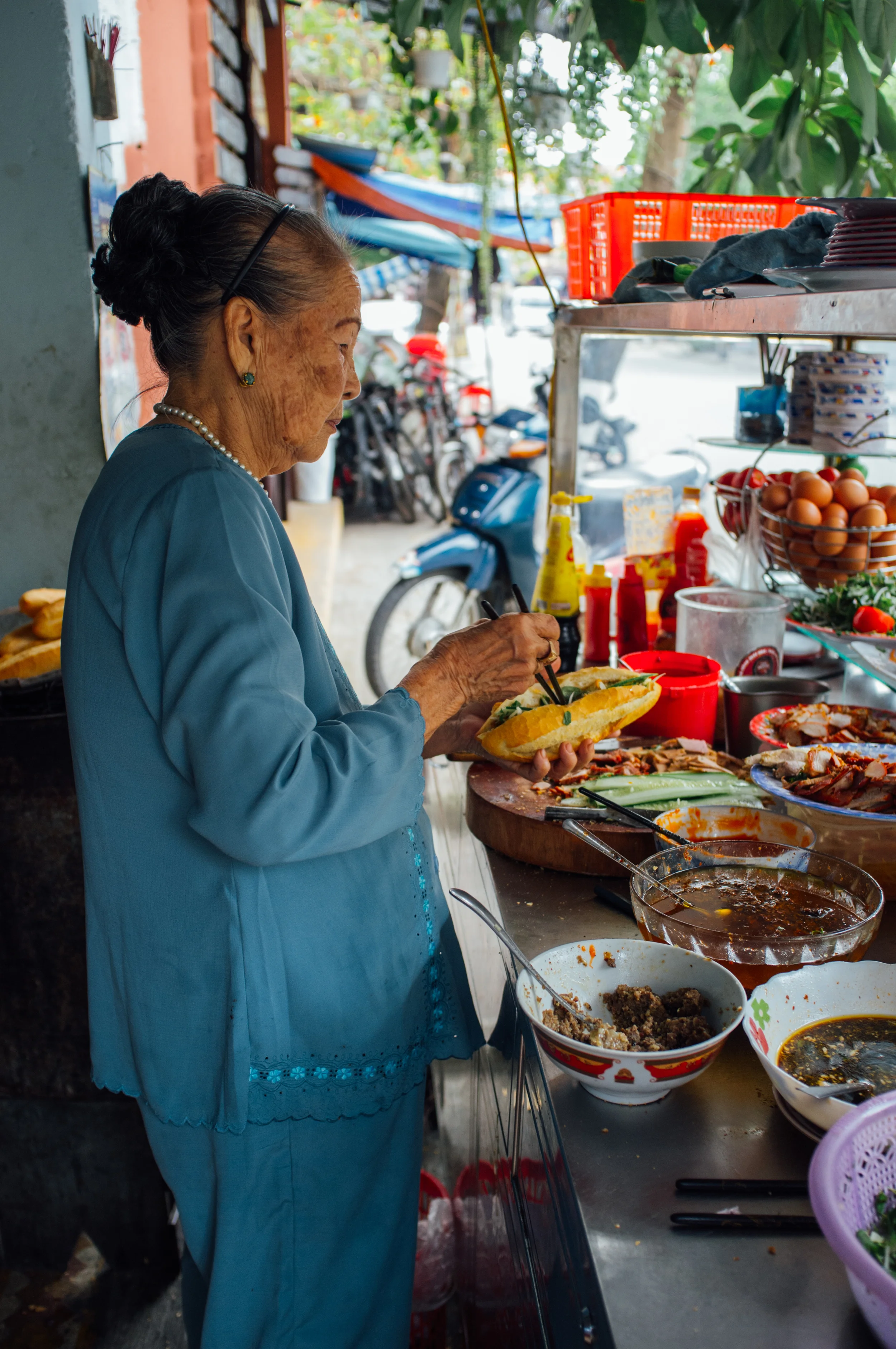 The “Bánh Mì Queen”, around 85 years old, still presides over the shop every single day