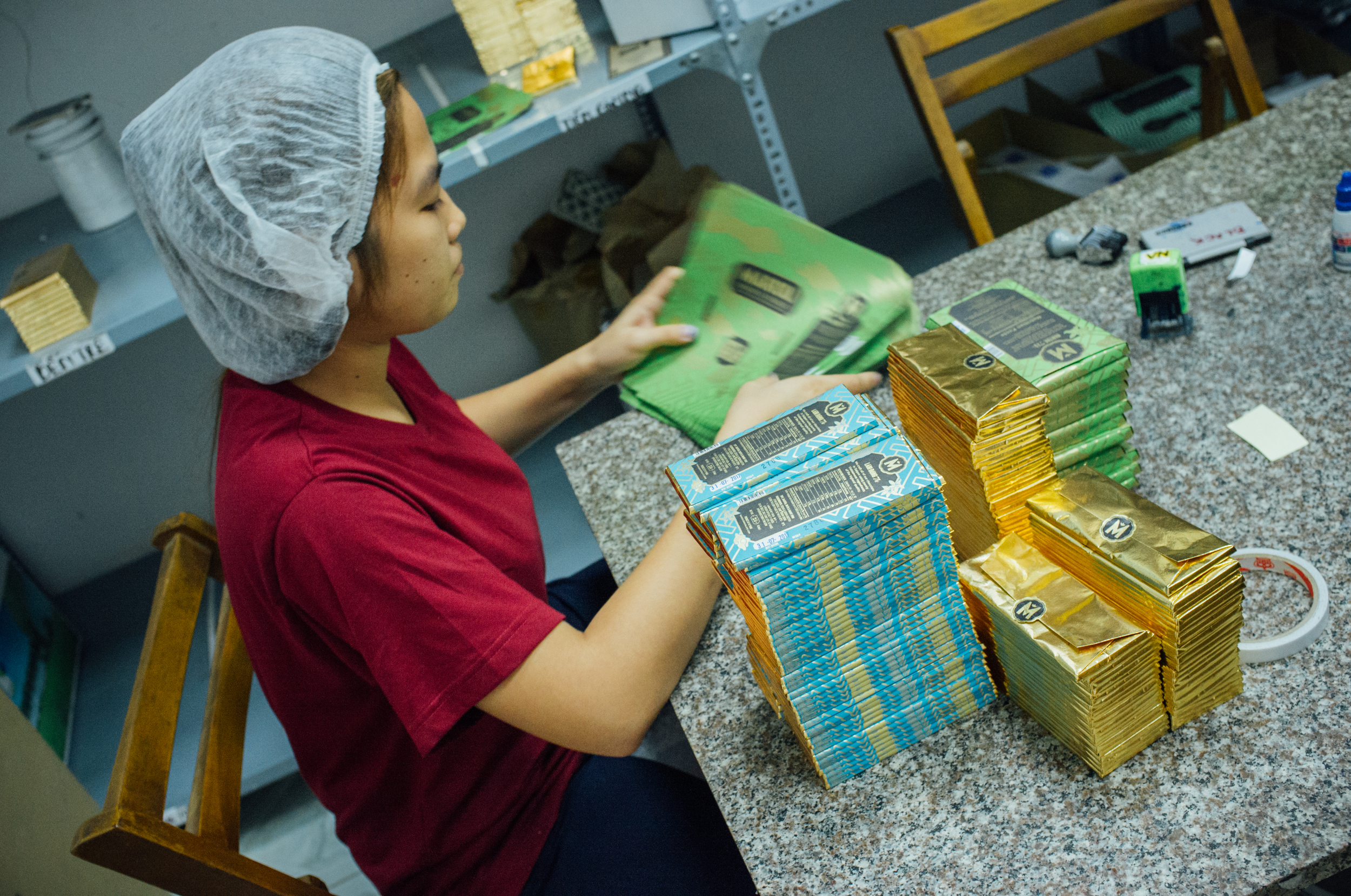 Hand-wrapping each bar