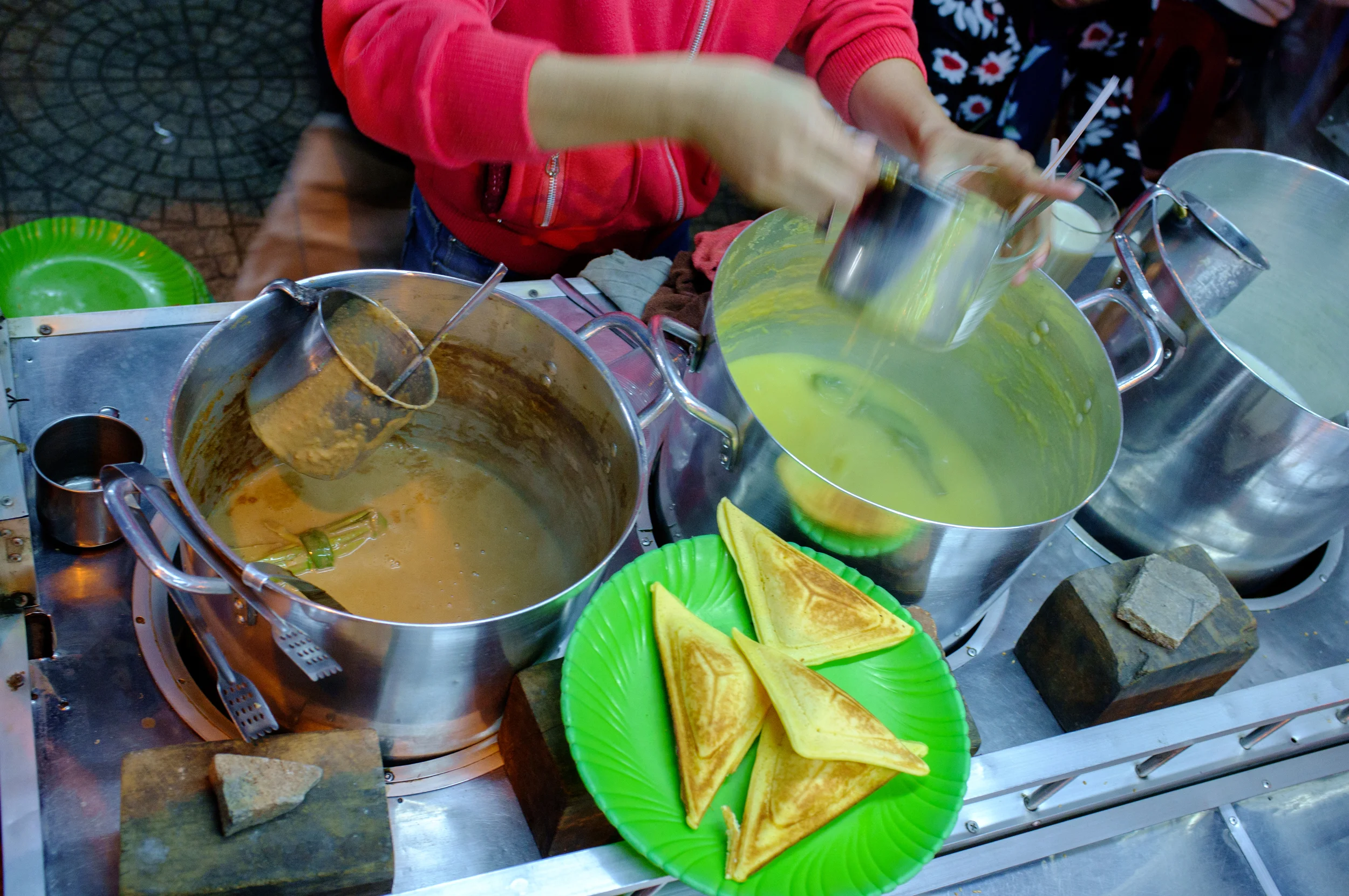 Sữa Đậu Phộng simmering away. Pandan leaves add a subtle flavor and aroma.