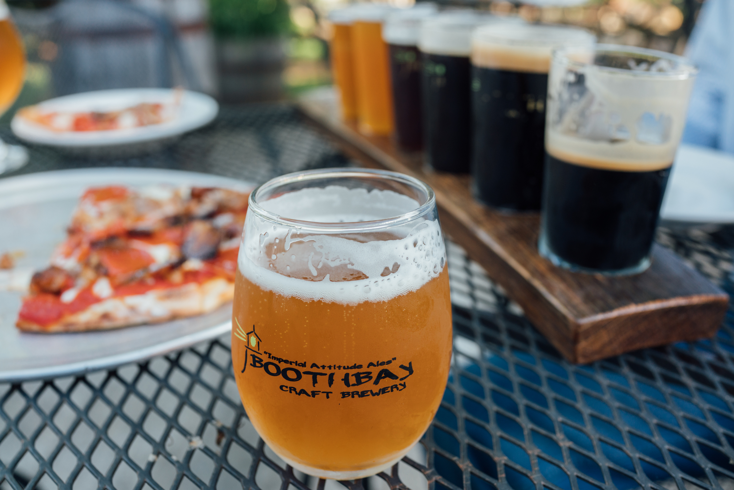 Boothbay Craft Brewery beer alongside wood fired pizza