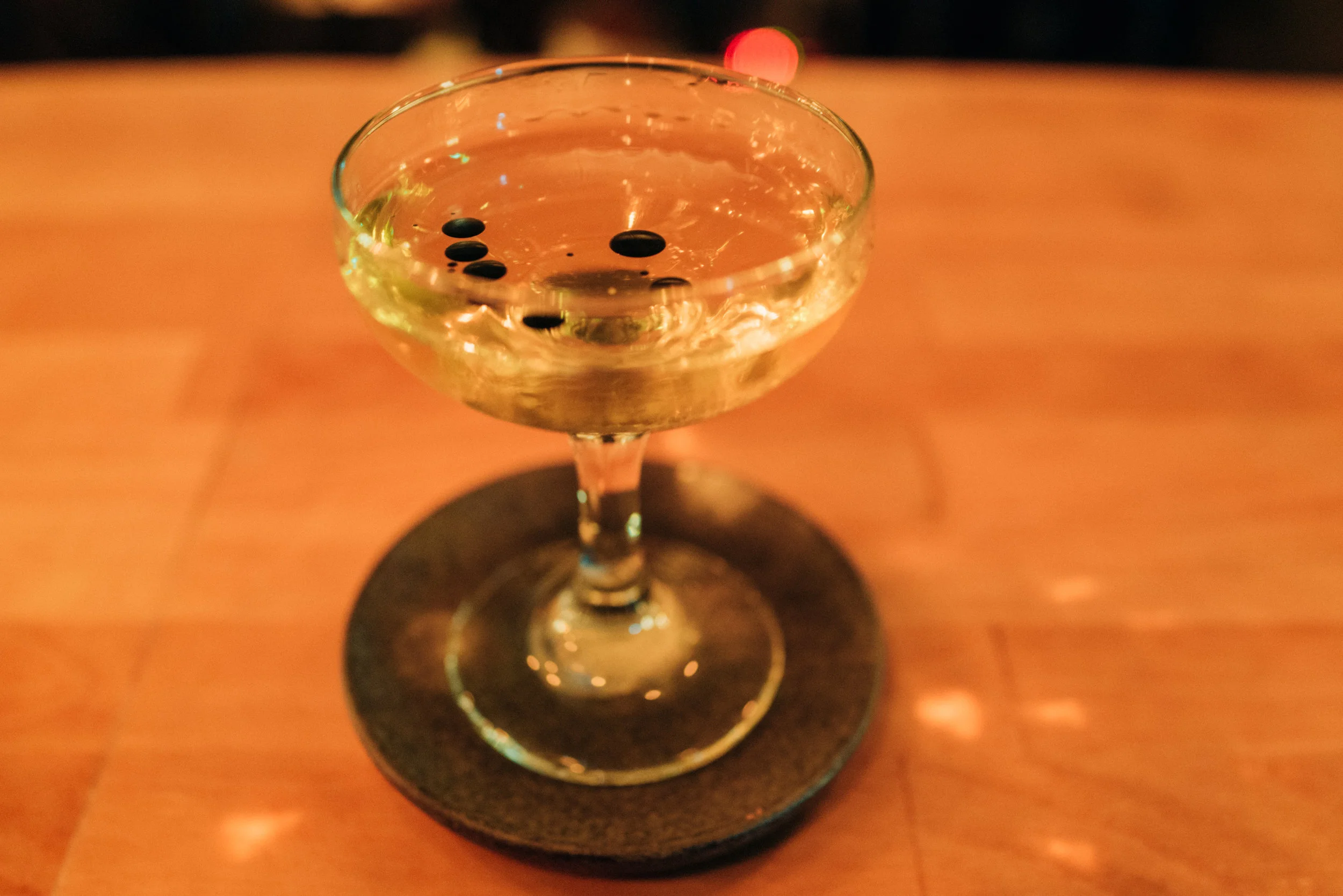Corn + Oil: charred corn and smoked agave and topped with hazelnut and lime oil at Operation Dagger