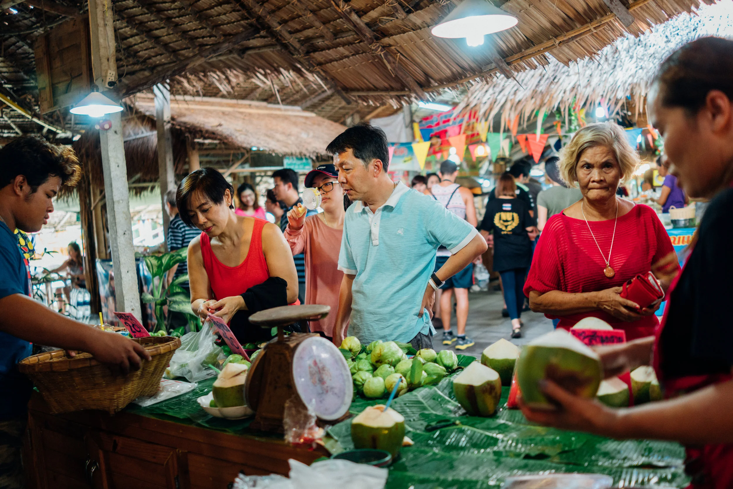 Fresh coconut water is always refreshing on a hot day, pictured here at Khlong Lat Mayom Floating Market