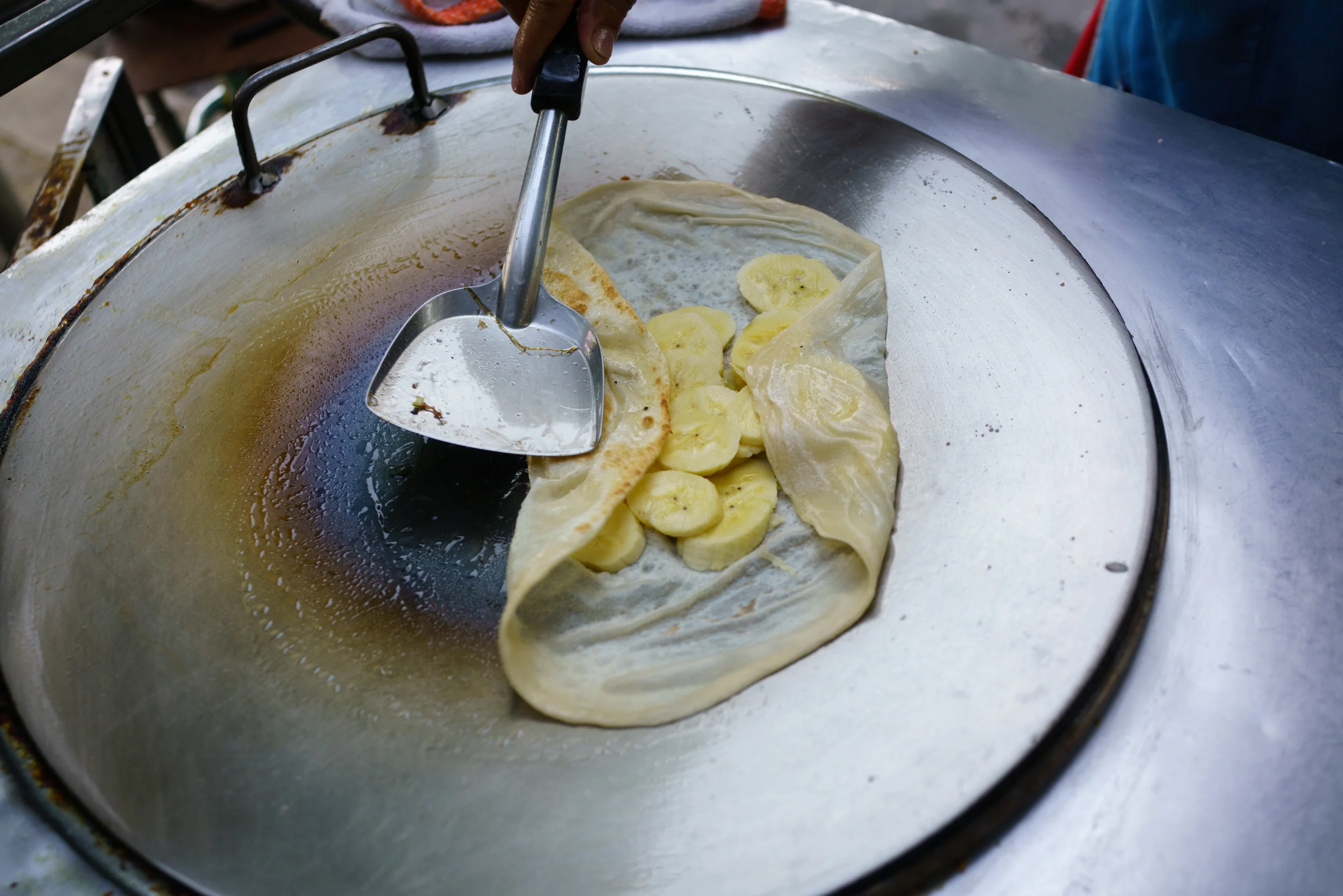 Thai crepe with banana and condensed milk