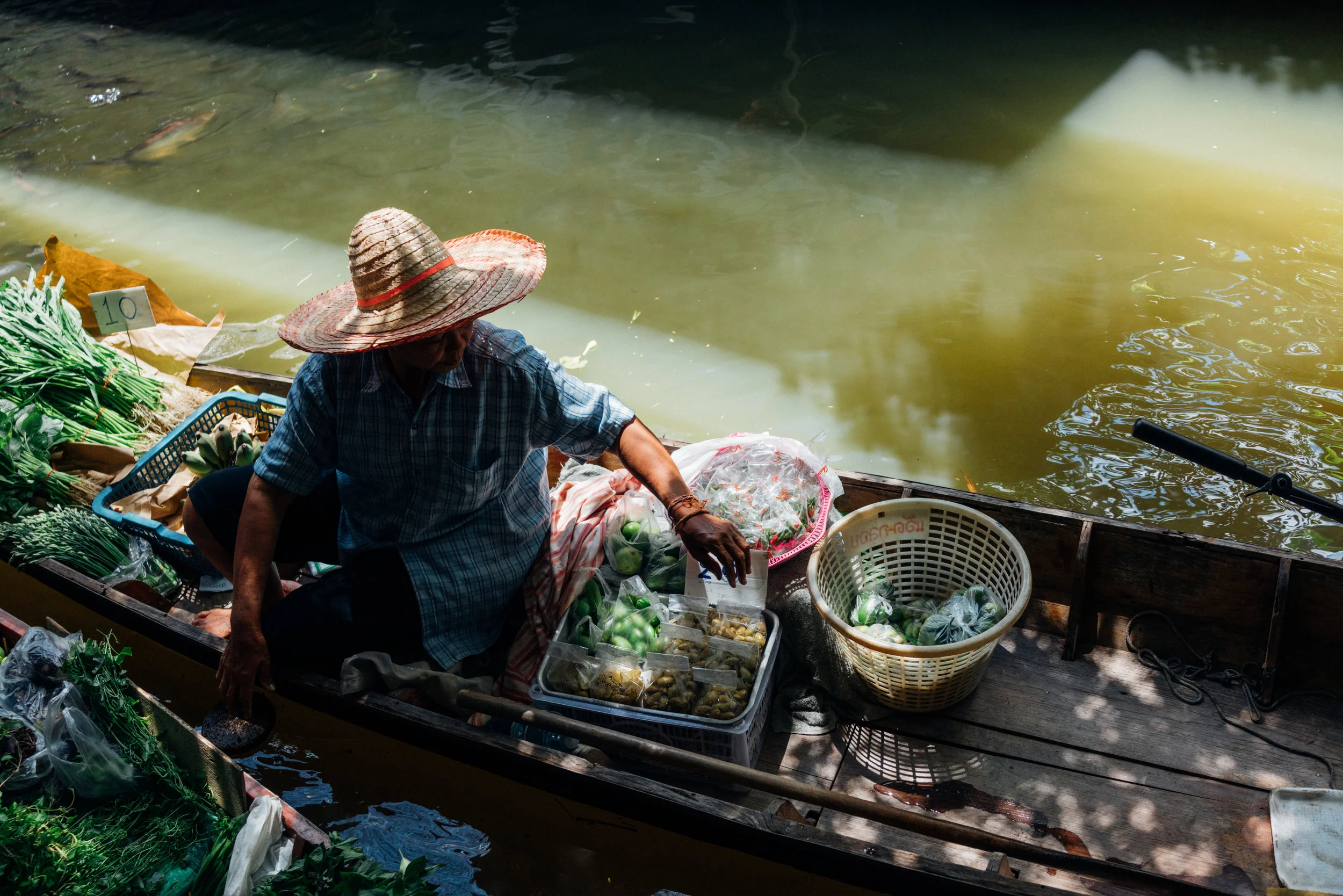 One of the few floating vendors at Khlong Lat Mayom Floating Market