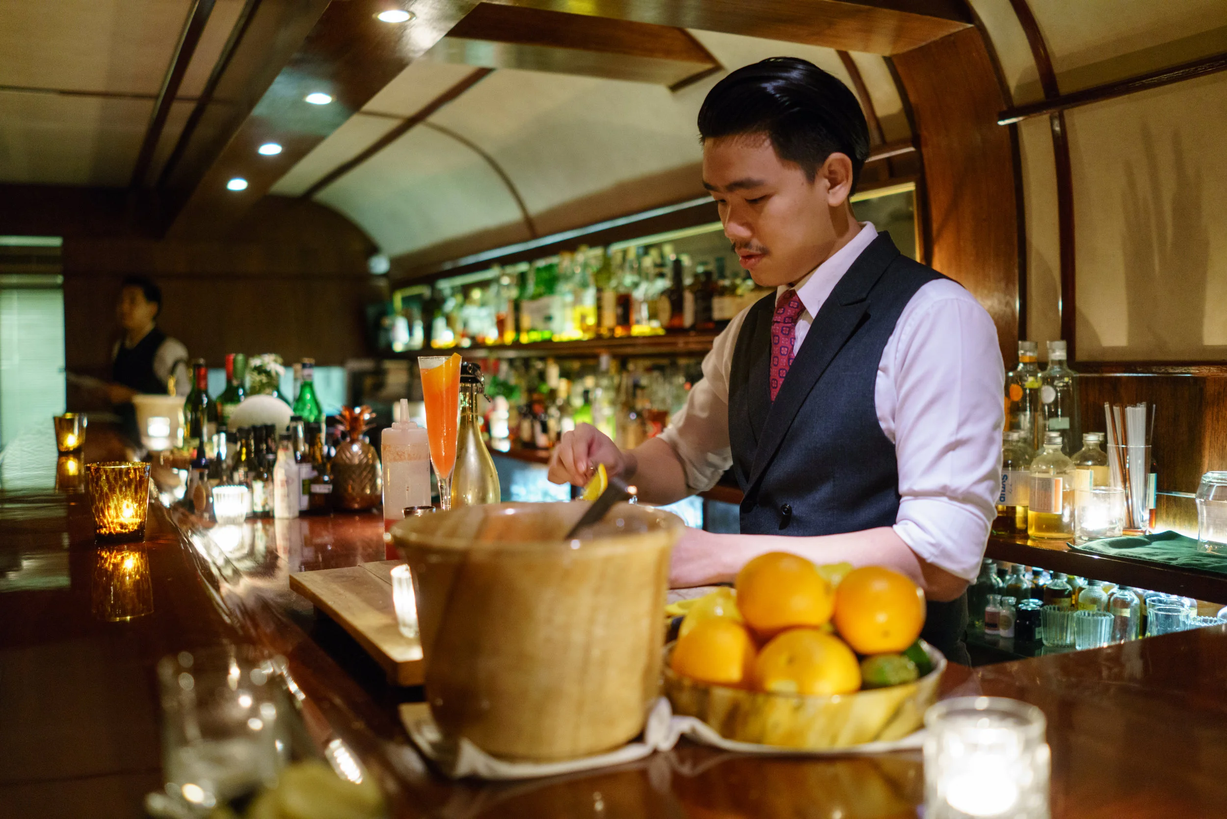 Mixing up drinks at Q&A Bar in Bangkok