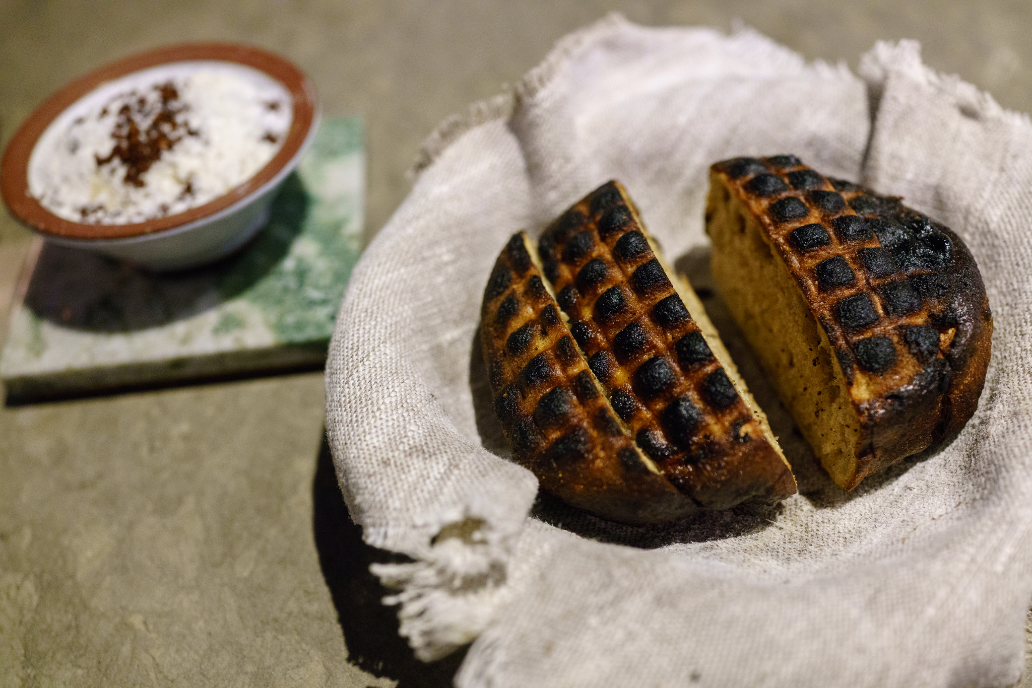 Grilled bread served with beurre noisette at Franzén in Stockholm