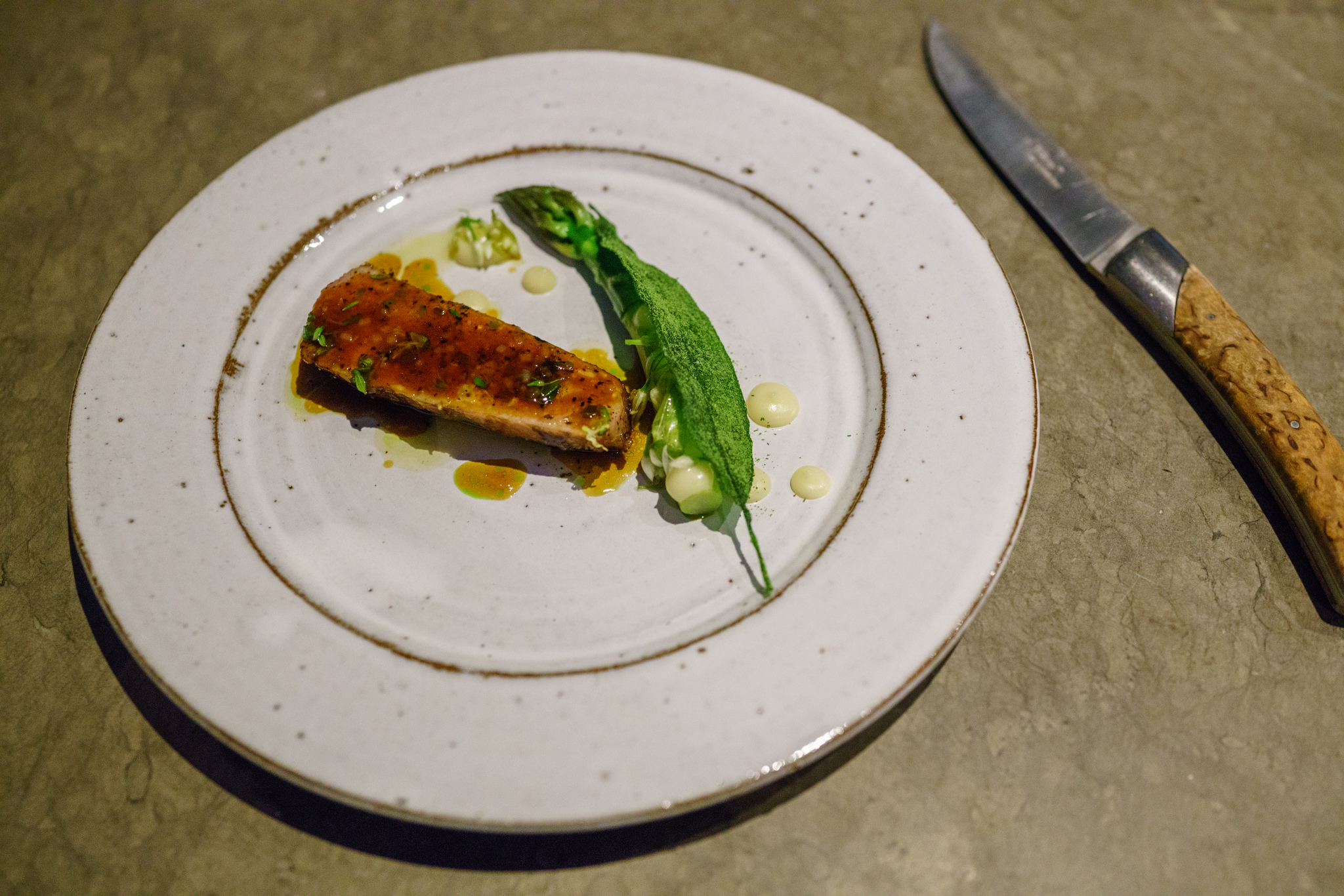 Spring lamb, glazed asparagus, ramson, algae and aged cheese at Frantzén in Stockholm