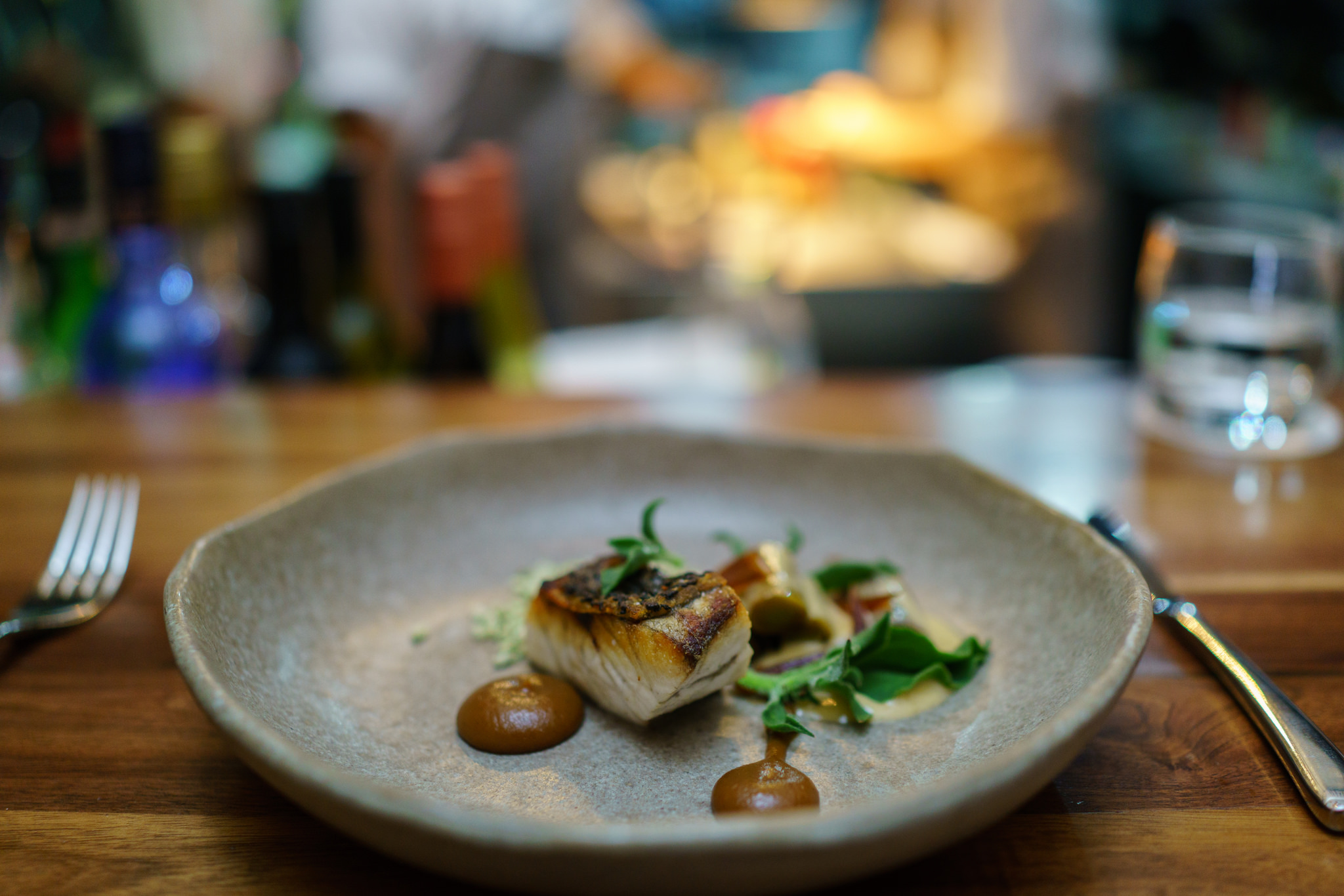 Barramundi, Leek, Bonito Butter, Caramelized Onion