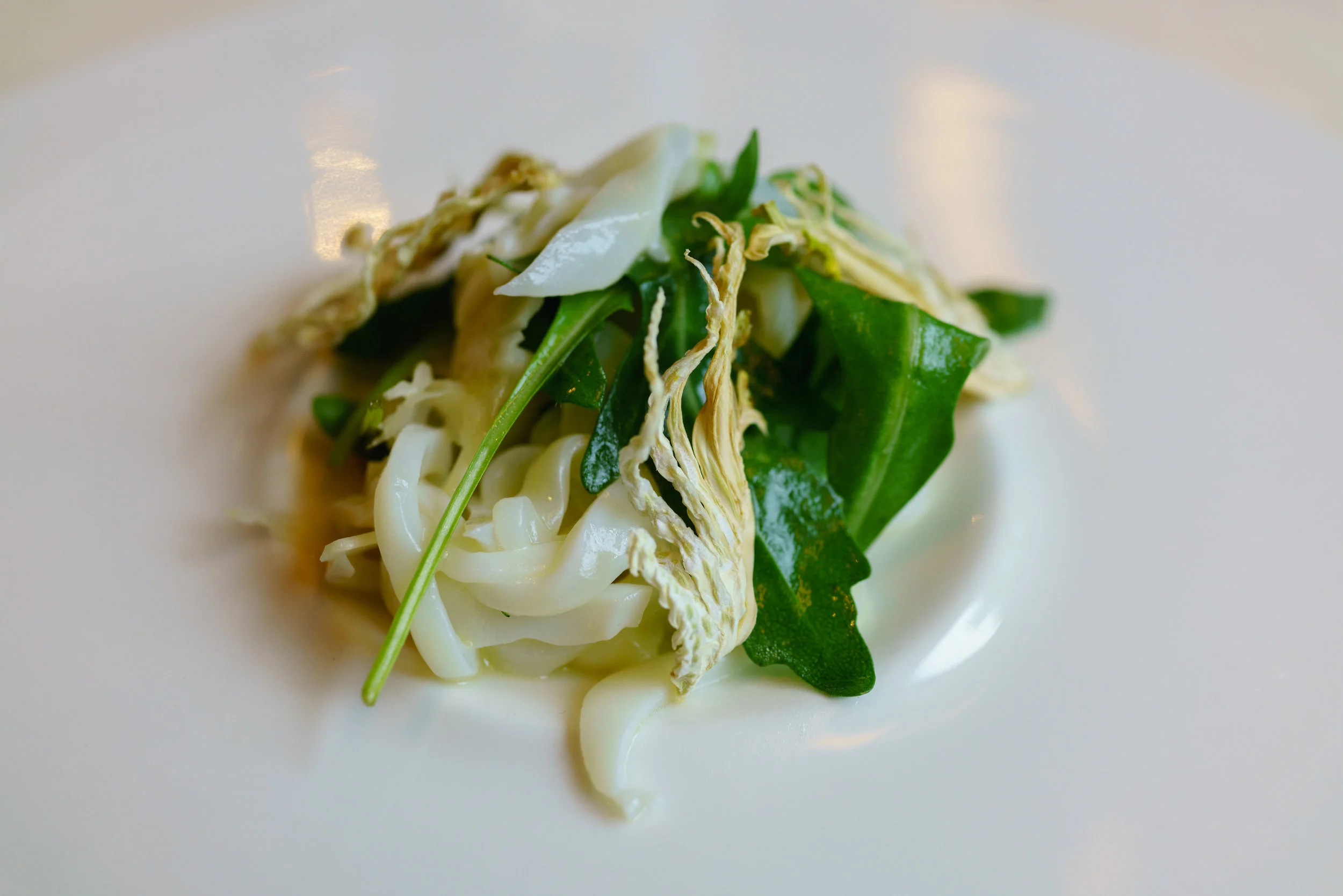 Cuttlefish, fennel, chickpeas, red lentils, rocket leaf, spiked with chili