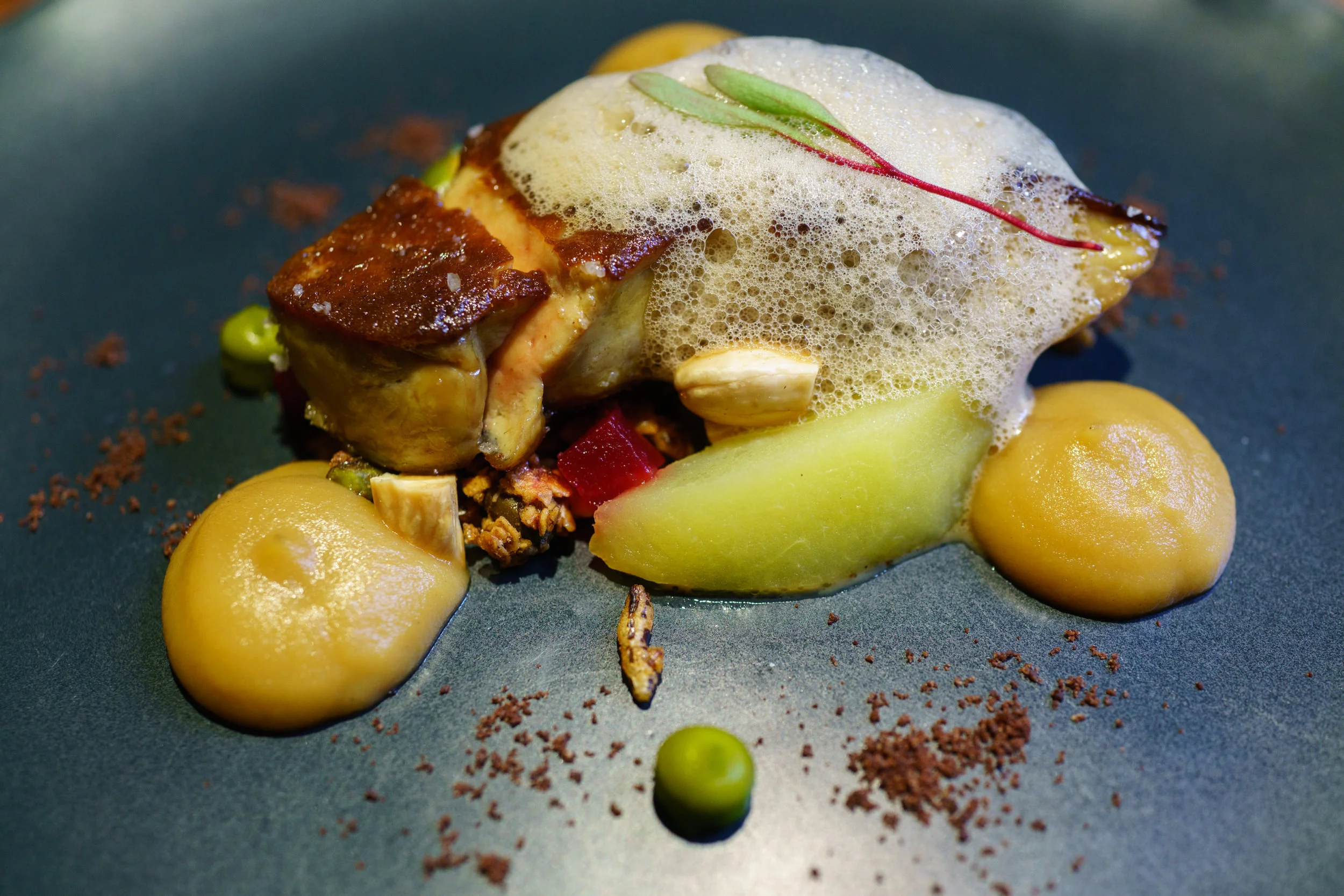 Seared foie gras, apple, granola, almond, coffee