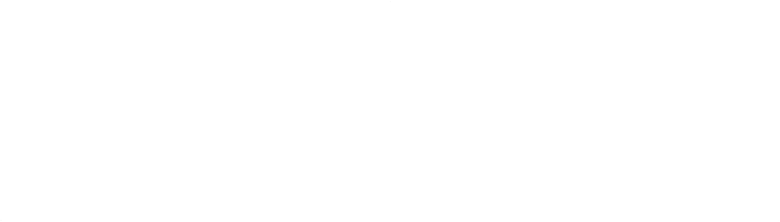 A black exterior wall with white trim forming a house shape, including a triangular roof and rectangular base.