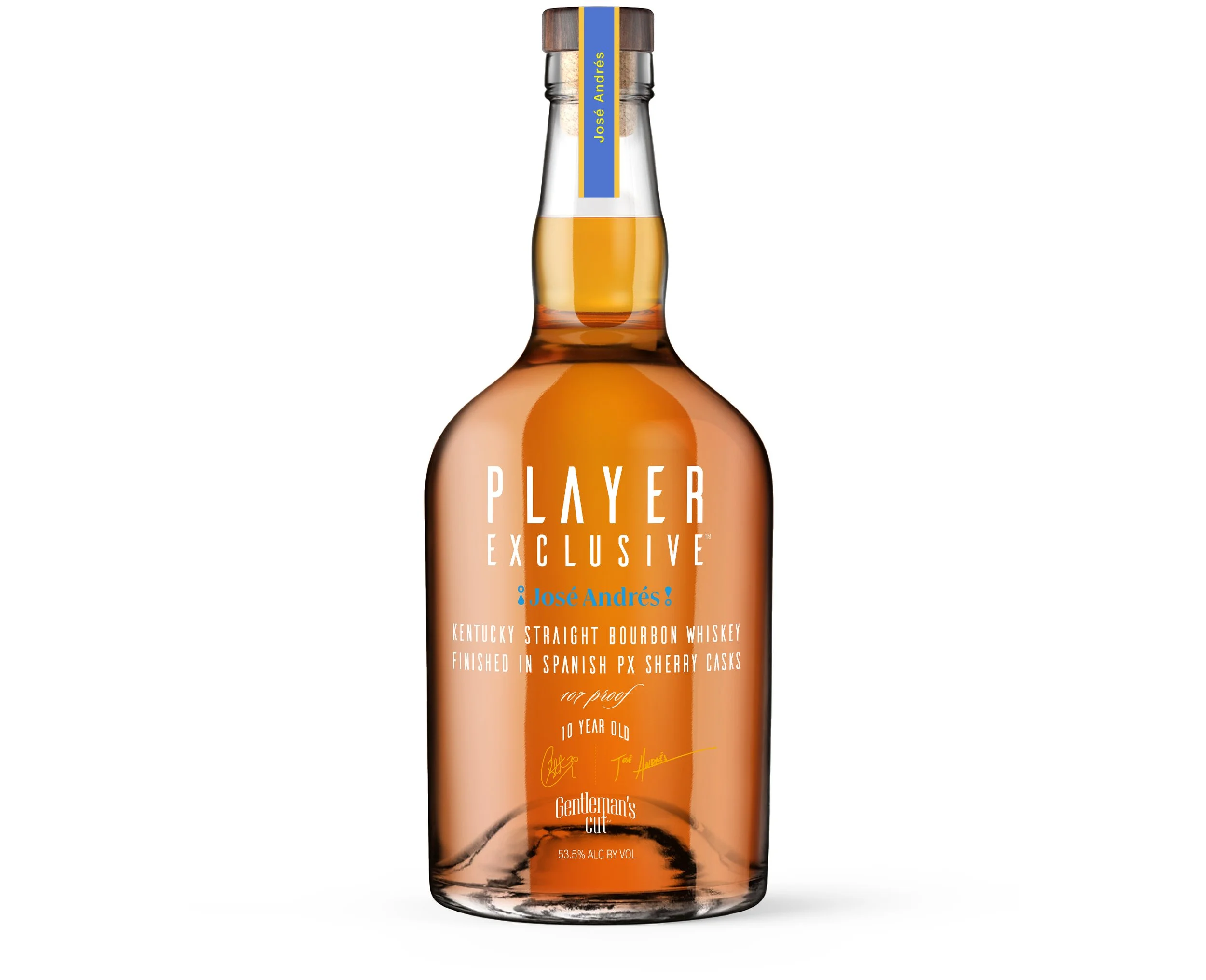 A bottle of bourbon whiskey with a label indicating it is a limited edition called 'Player Exclusive,' finished in Spanish PX sherry casks, with 107 proof and 10 years old, signed by José Andrés, and produced by Gentleman's Cut.