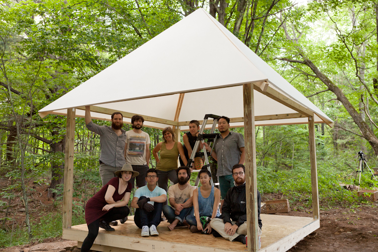 The whole crew in the structure sans walls