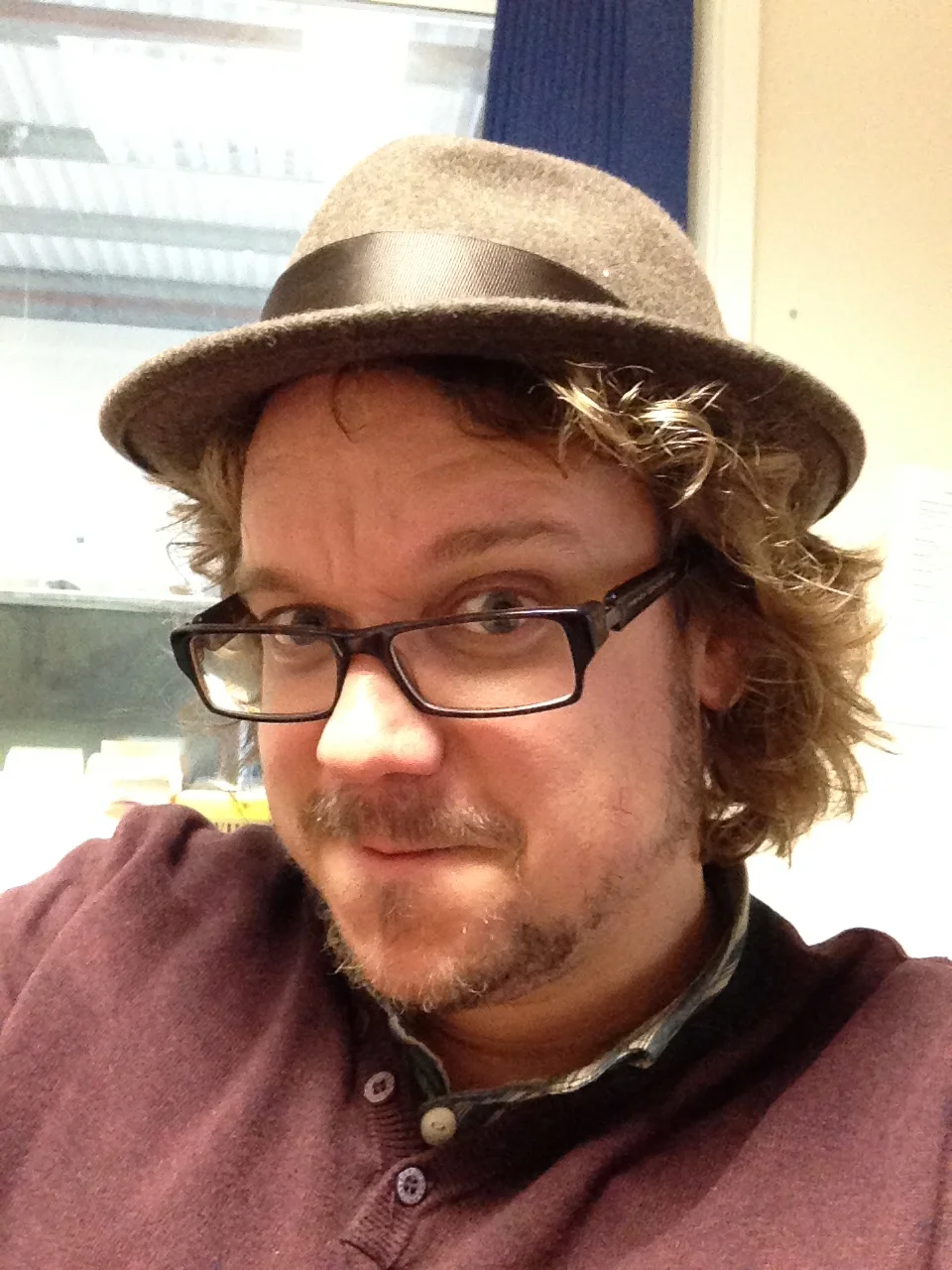 I experiment with hats.