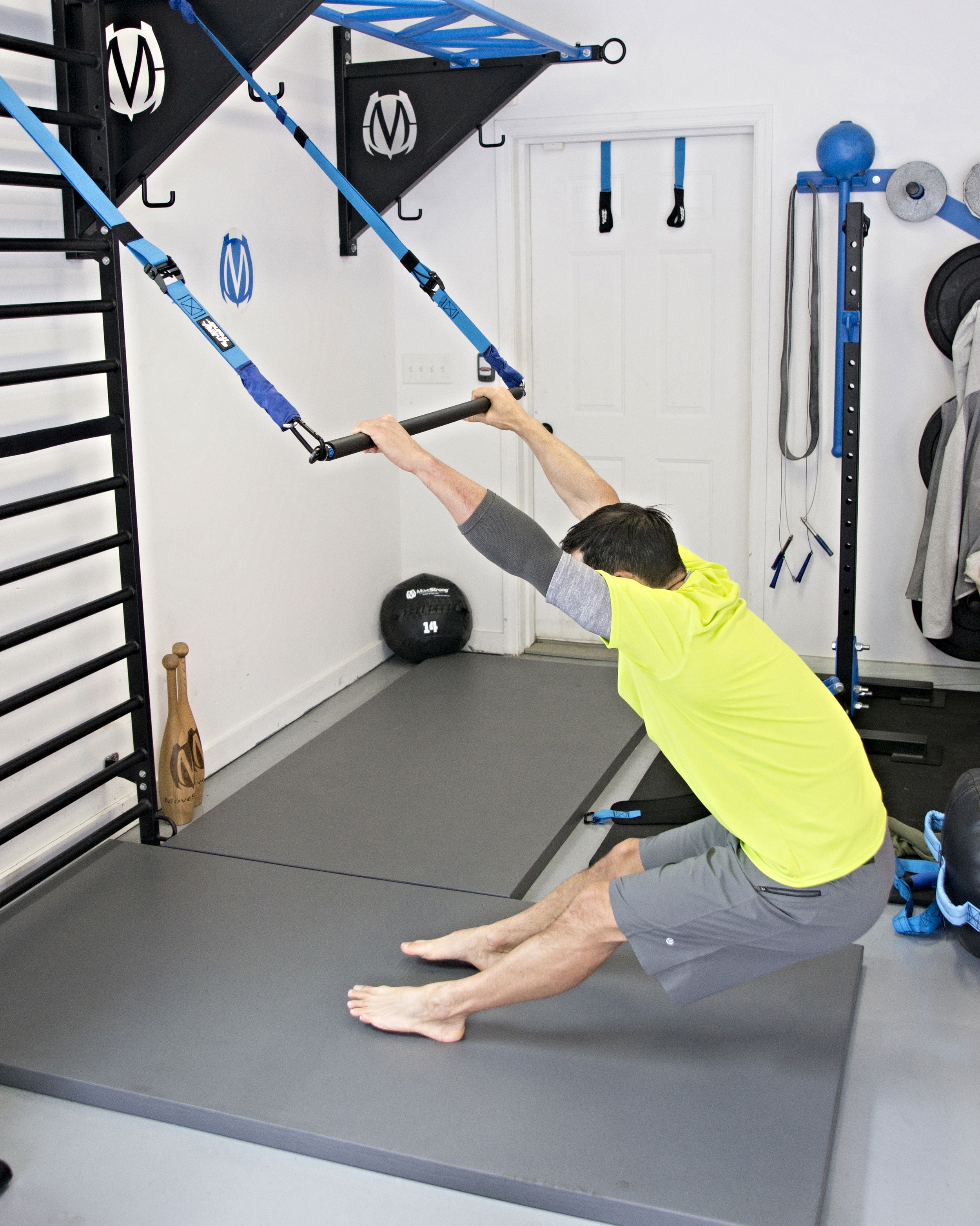 Elevate suspension bar mobility exercise