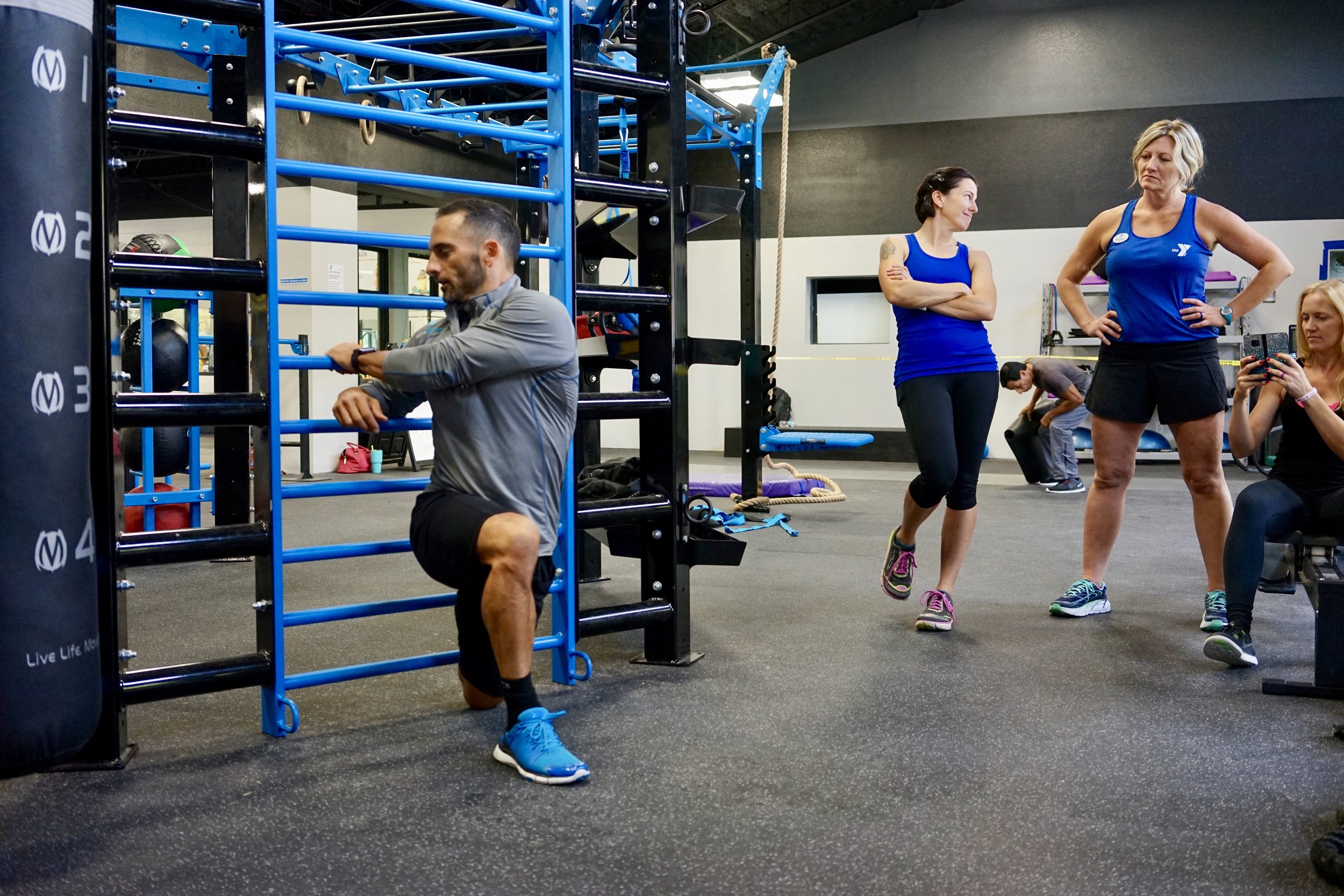 Stall bars quad and hip flexor stretch