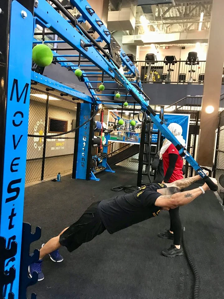 Elevate Trainer Bar plank reach
