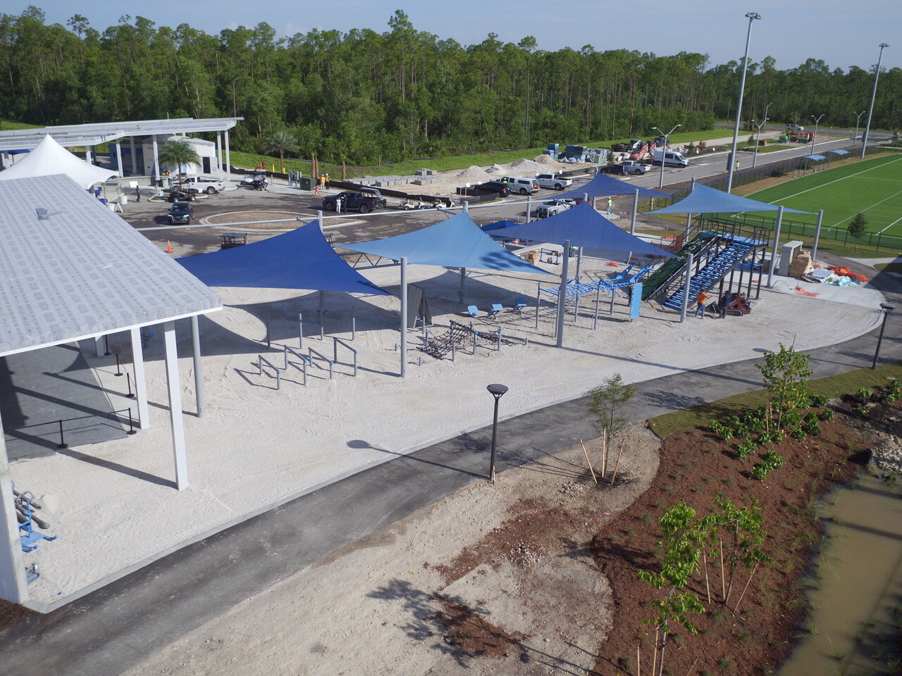 MoveStrong Collier County Paradise Coast Sports Complex Outdoor Installations Construction Phase Overhead Cover Installations 