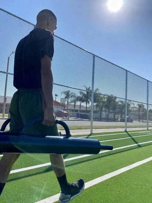 Farmer log carry-obstacle course high school physical education
