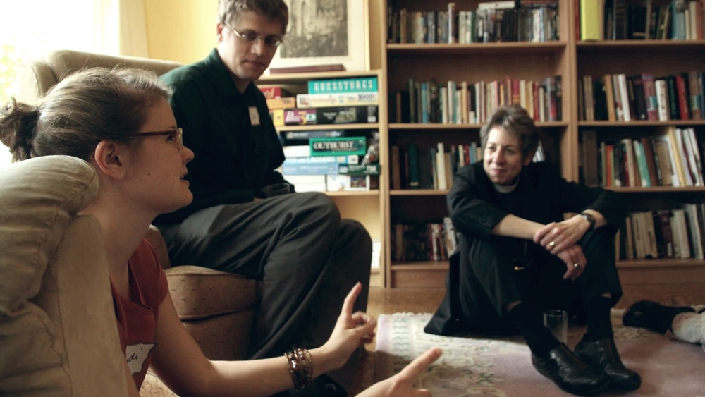 Heidi Thorsen ('13-'14) and David Burman ('12-'14) speaking with the Presiding Bishop of the Episcopal Church from 2006-2015, the Most Rev. Katharine Jefferts Schori.