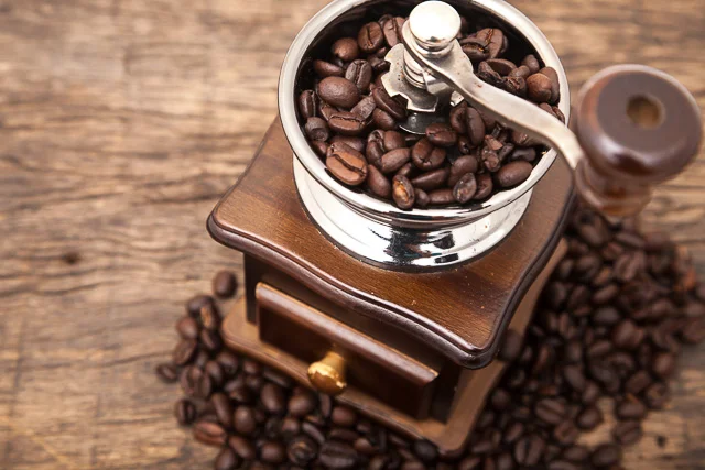 bigstock-Close-Up-Fresh-Coffee-Bean-In--67713217.jpg