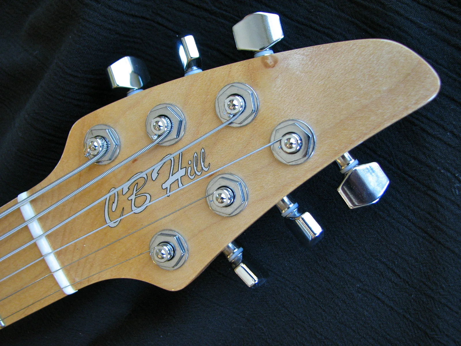 The paintbrush headstock puts the Sperzel locking tuners in the optimal positions