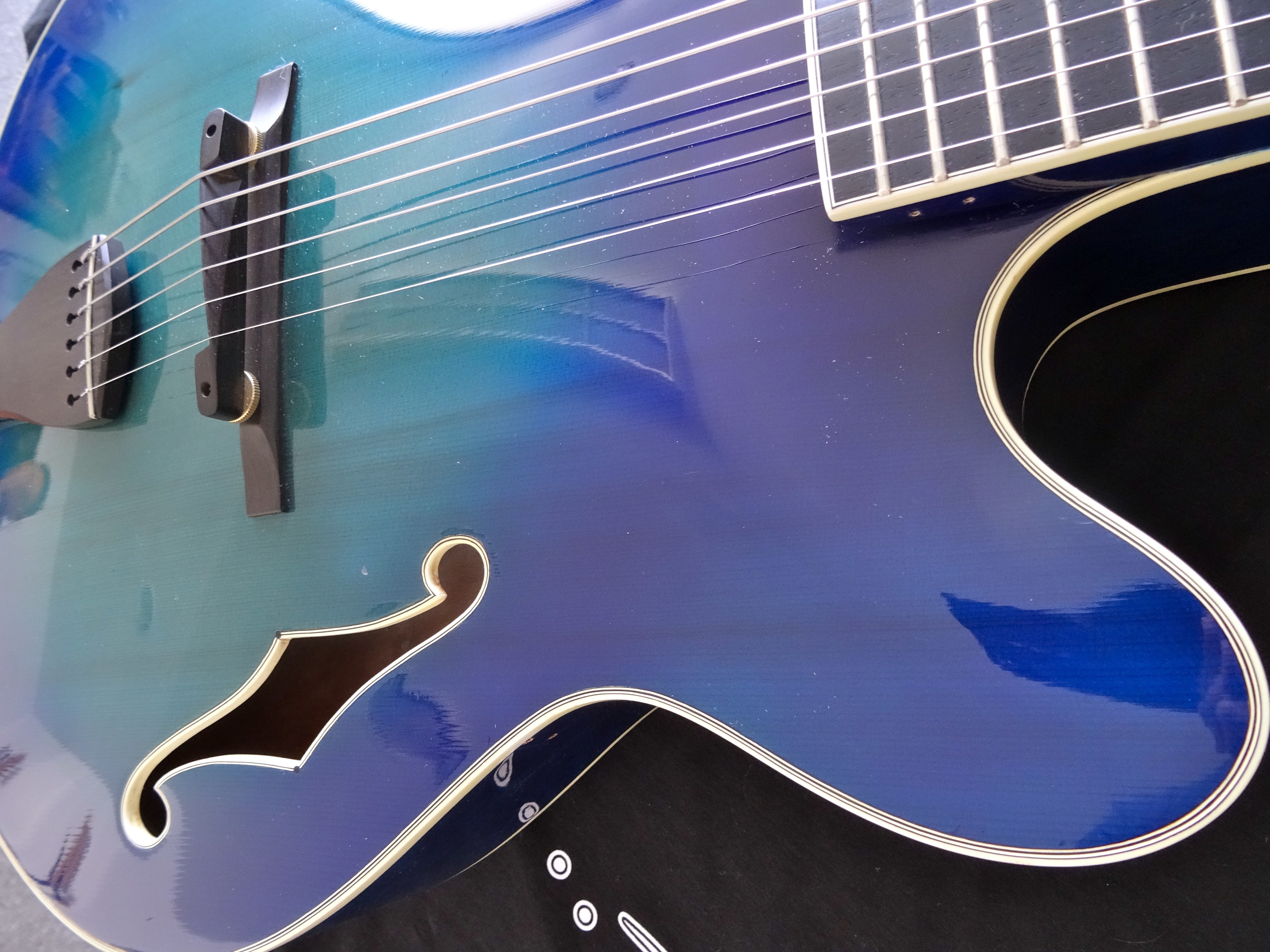 Built in 1996, this guitar had a pickup and pickguard which have both been removed.