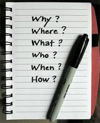 notepad with questions.jpeg