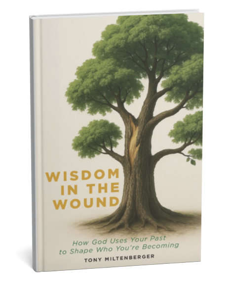 Book cover titled "Wisdom in the Wound" with an illustration of a large tree with green leaves and a sturdy trunk, and the subtitle "How God Uses Your Past to Shape Who You're Becoming" by Tony Miltenberger.