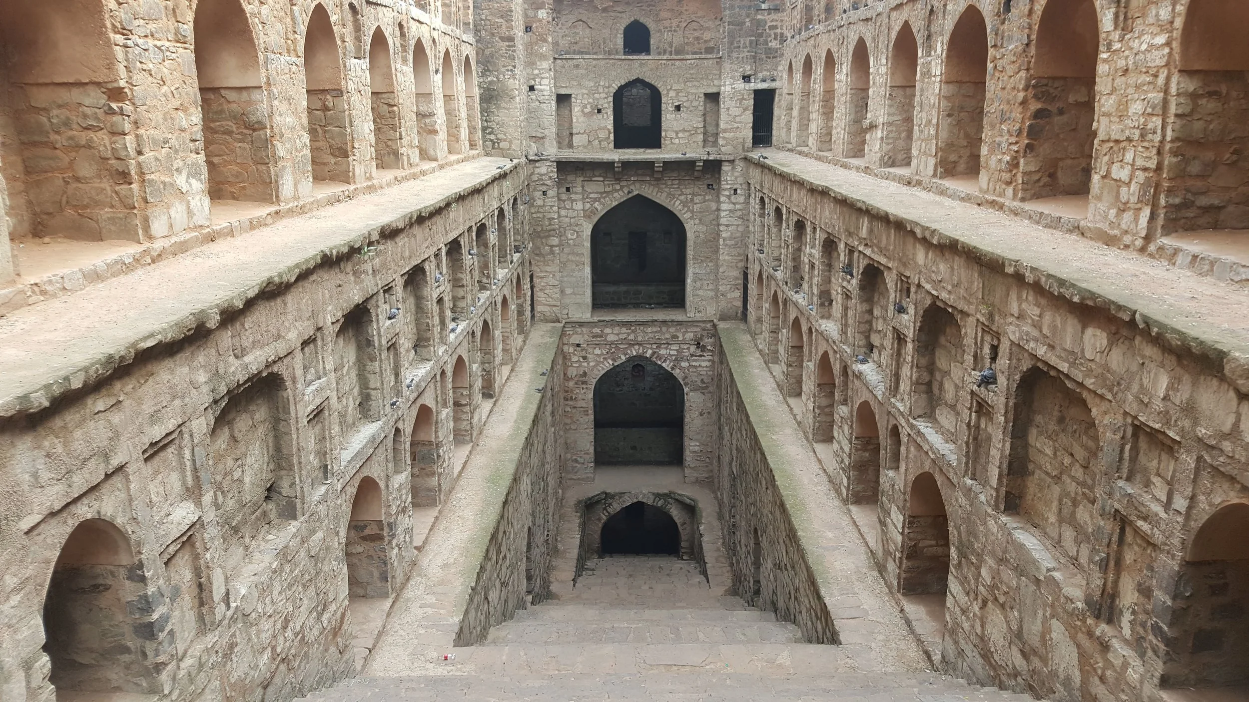   Agrasen Ki Baoli   (अग्रसेन की बावली) is a refuge. An historic step-well and a sacred space, this remarkable structure provided water-access to both human and more-than-human residents for over seven centuries. But like many cities in the Global So