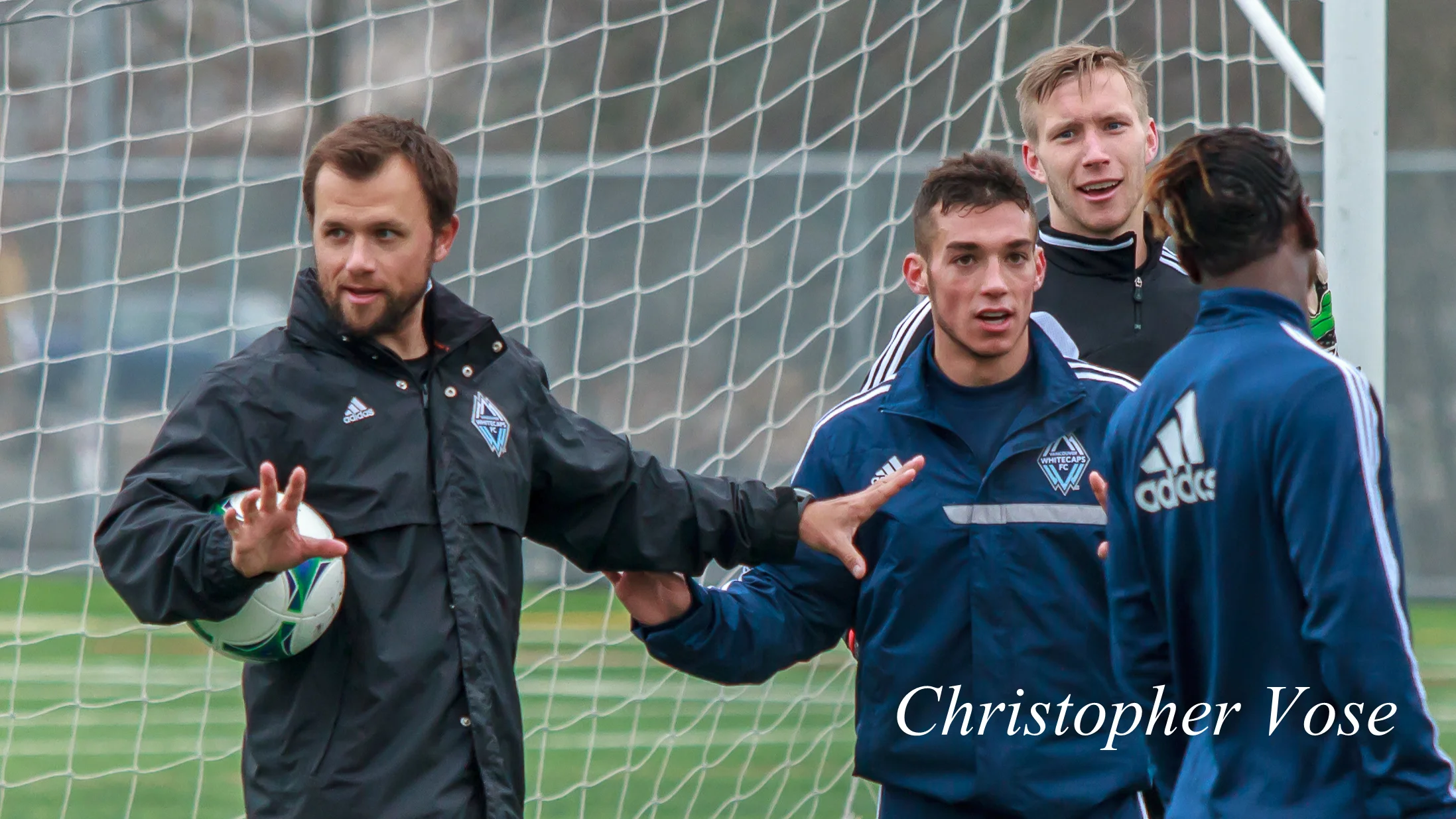 Jake DeClute, Russell Teibert, and Simon Thomas discuss how to defend a corner at the Burnaby Lake Sports Complex on 11 February 2013.