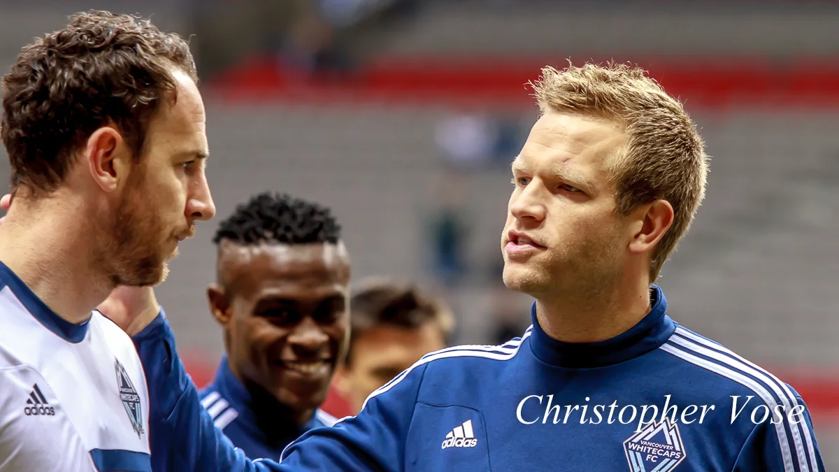 Andy O'Brien and Jay DeMerit speak before a match at BC Place on 2 March 2013.