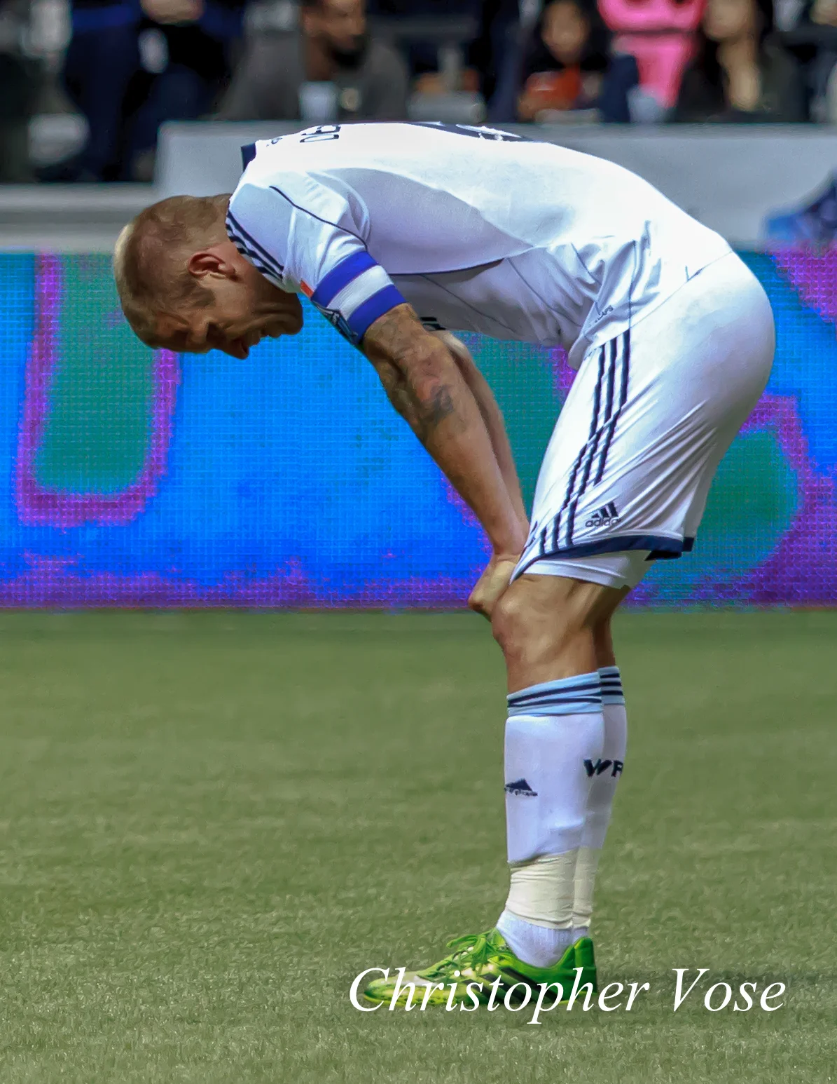 An exhausted Jay DeMerit finally takes a moment after the final whistle at BC Place on 8 September2013.