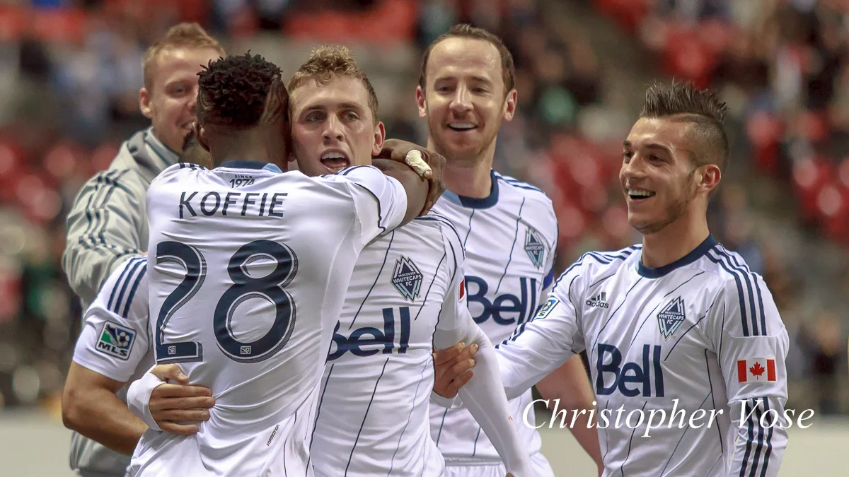 Marius Røvde, Gershon Koffie, Andy O'Brien, and Russell Teibert celebrate Corey Hertzog's goal at BC Place on 1 May 2013.