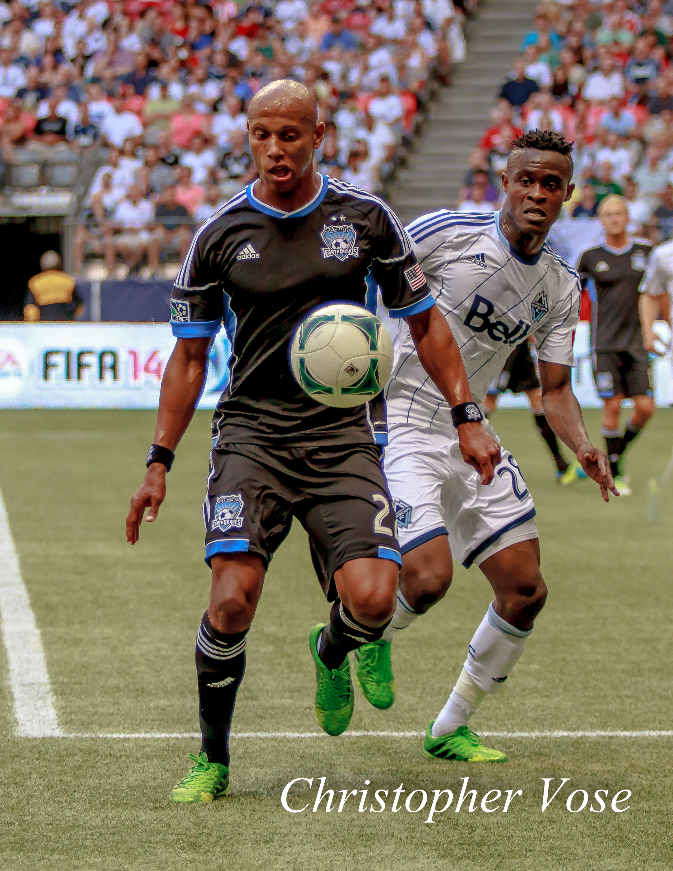 Jordan Stewart and Gershon Koffie chase the ball.