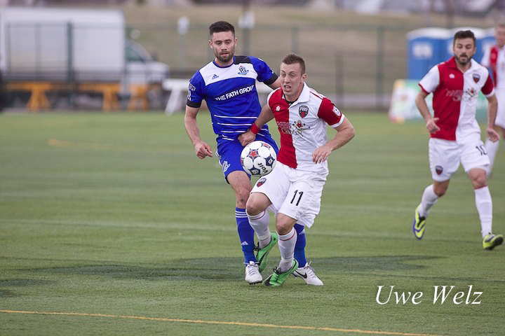 Ritchie Jones and Oliver at Clarke Stadium on 30 April 2014.