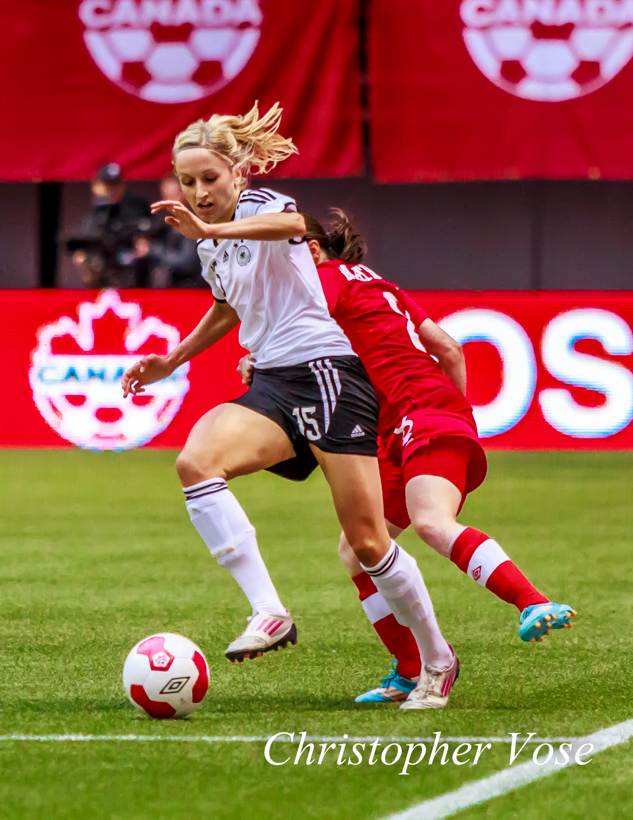 Kathrin Hendrich and Diana Matheson clashed at BC Place on 18 June 2014.