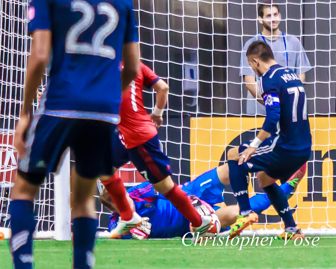 Dan Kennedy had the ball between his glove and the turf before Pedro Morales kicked it over the line.