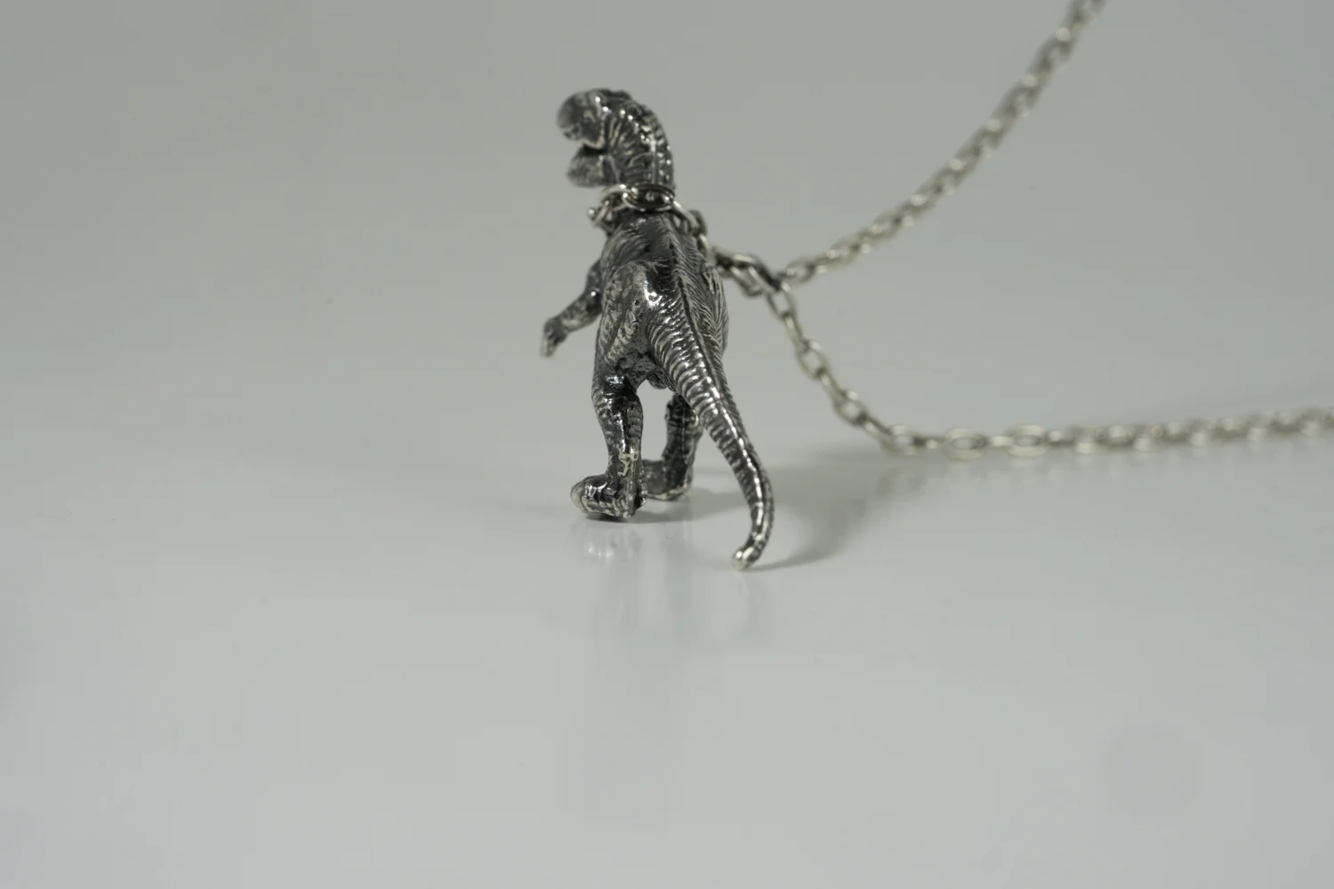 t-rex_necklace_silver_oxi_back.jpg