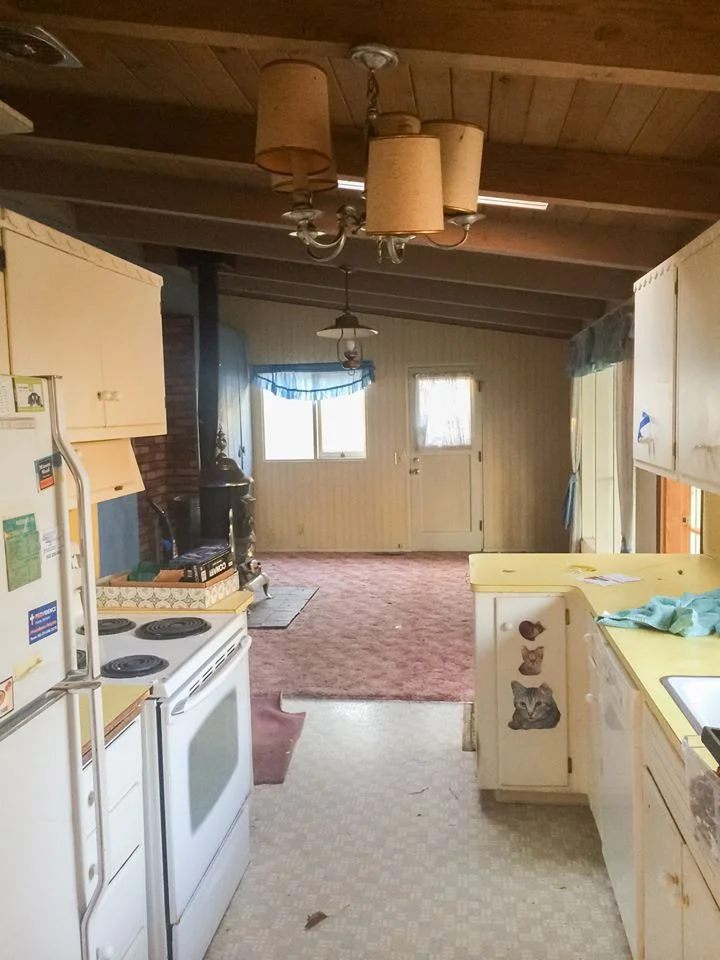 From the living room through the kitchen to the family room. Sunroom is on the right. 