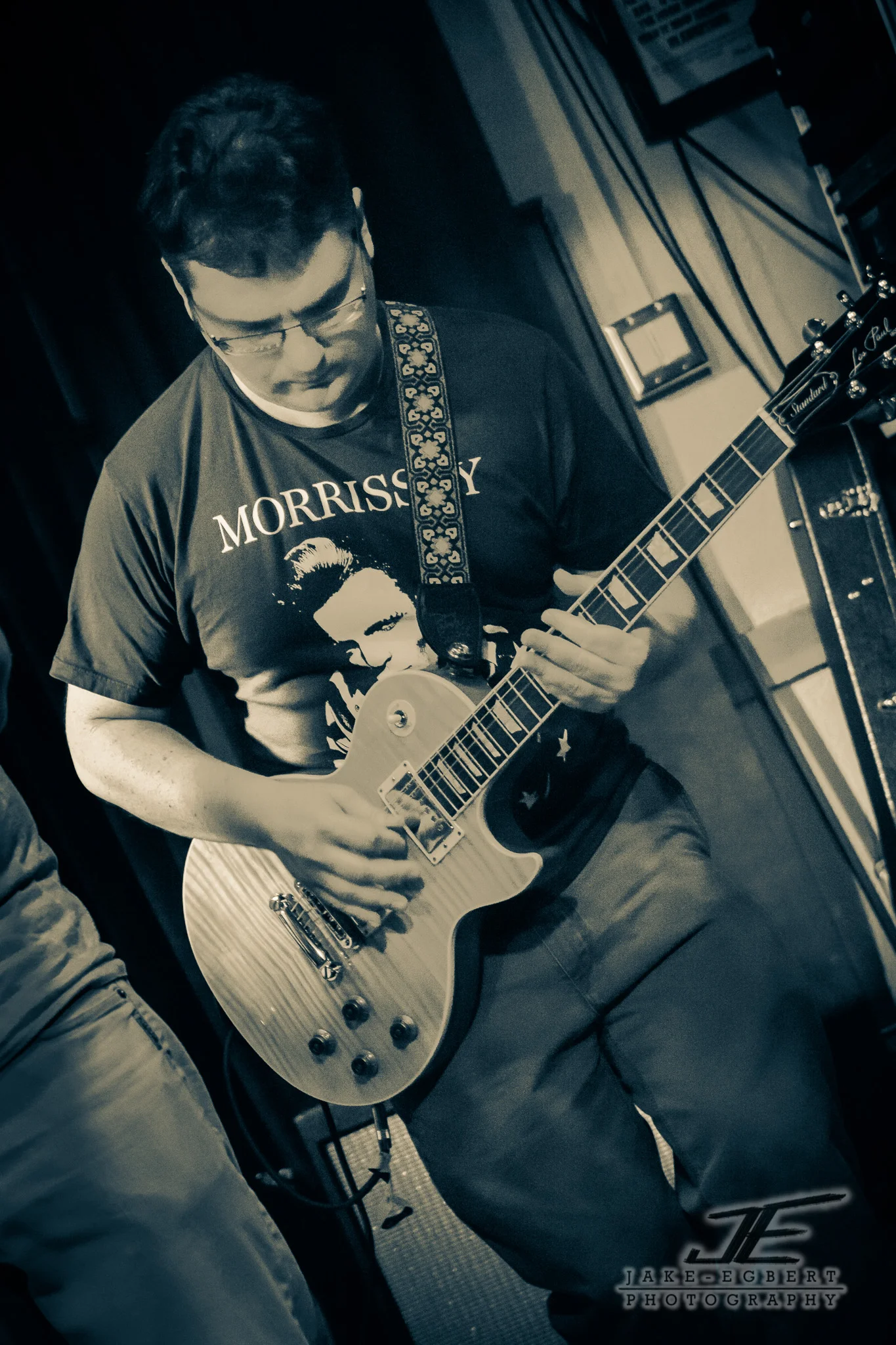 Matt Shomphe on Guitar and sporting a Morrissey T-shirt.