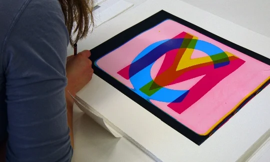 Signing the Dawn of the Rainbow 6 colour screen print edition. 