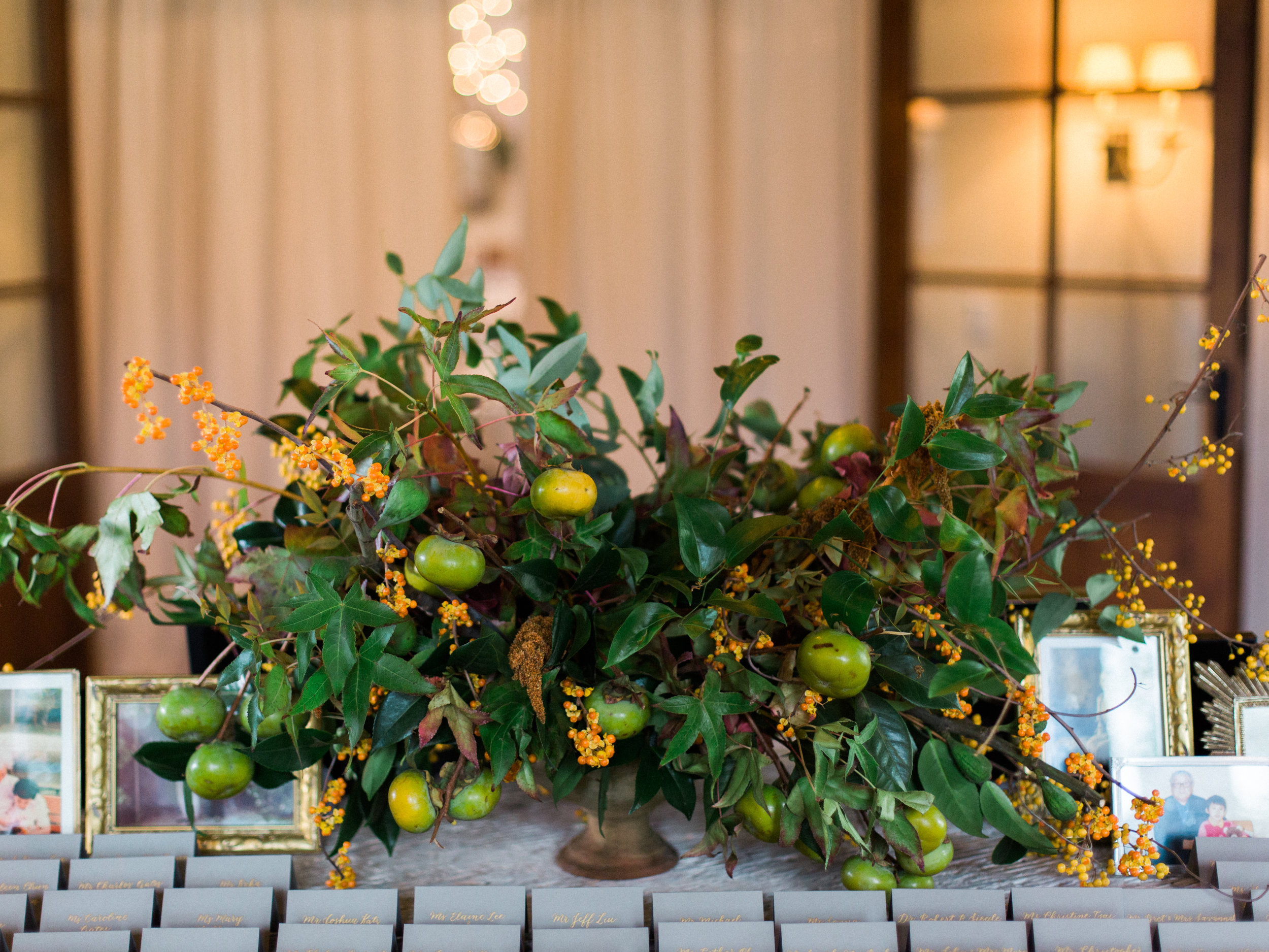 Natural escort card table arrangement by Wild Green Yonder at Pippin Hill wedding in Charlottesville