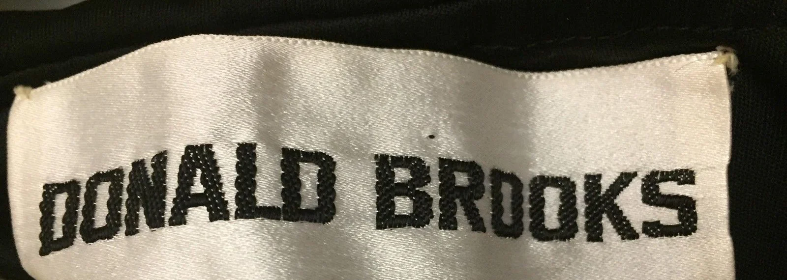 A_Part_of_the_Rest_Vintage_1970s_donald_brooks_black_jersey_disco_dress_label.jpg