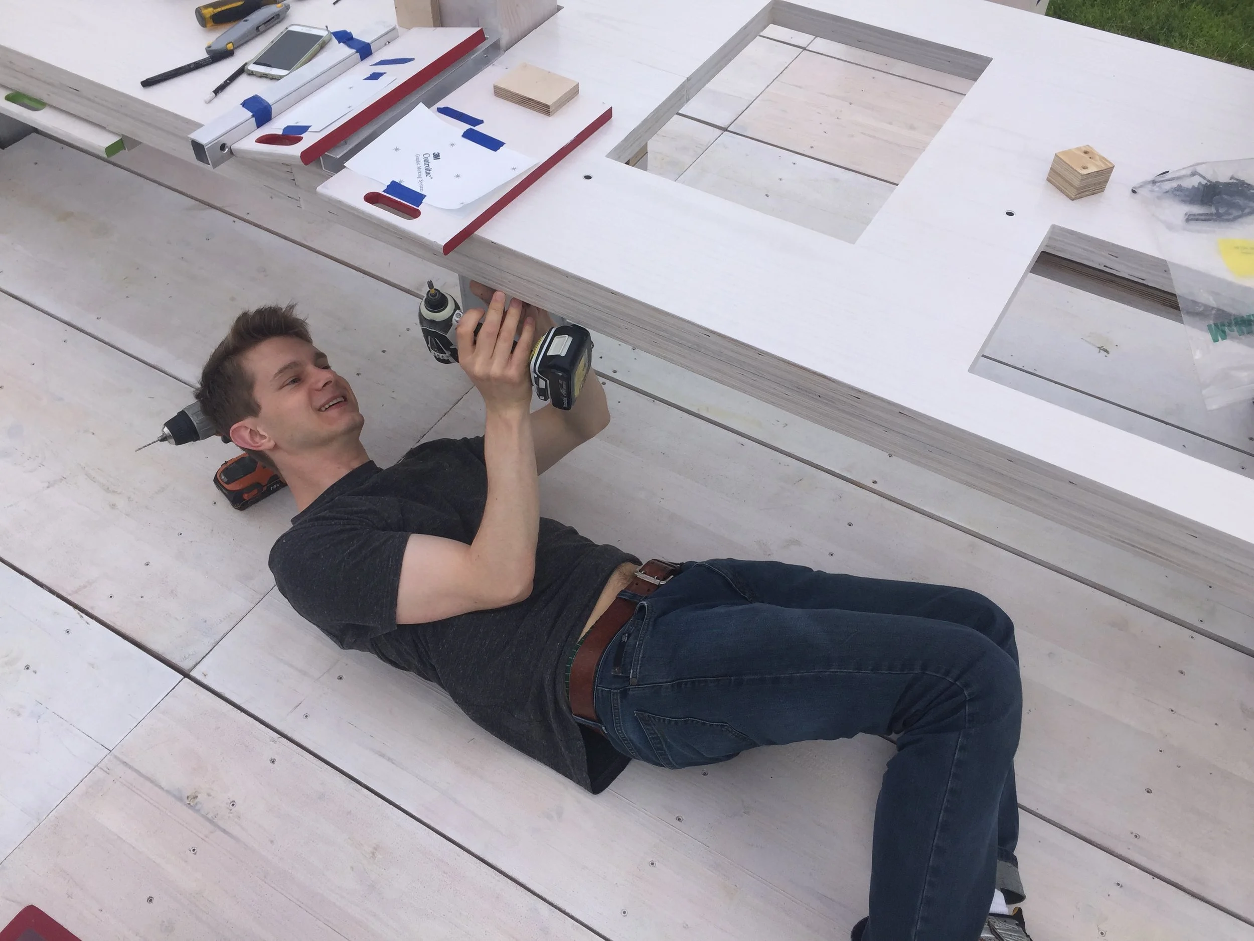  Installation of table sections, sliding information panels, and vitrines containing objects of the home 