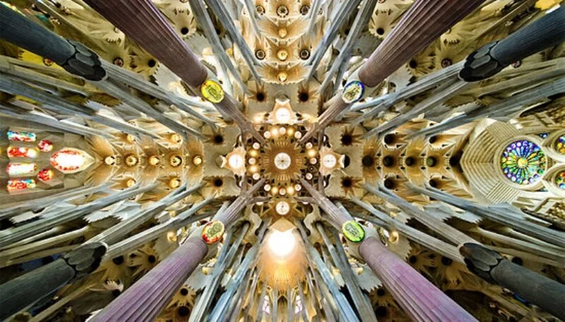 The following view of the vaulted ceiling of the sanctuary and numerous hyperbolic light-wells portrays the reflective capability of the great hall