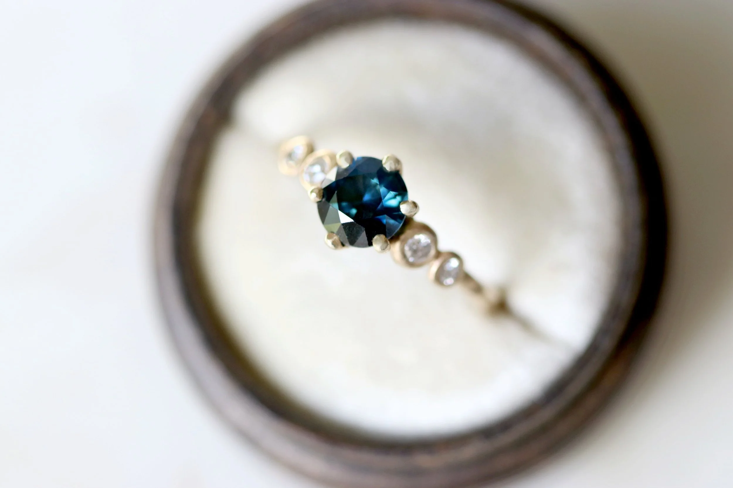 1.2ct_blue_sapphire_steppingstonering_inbox.jpg