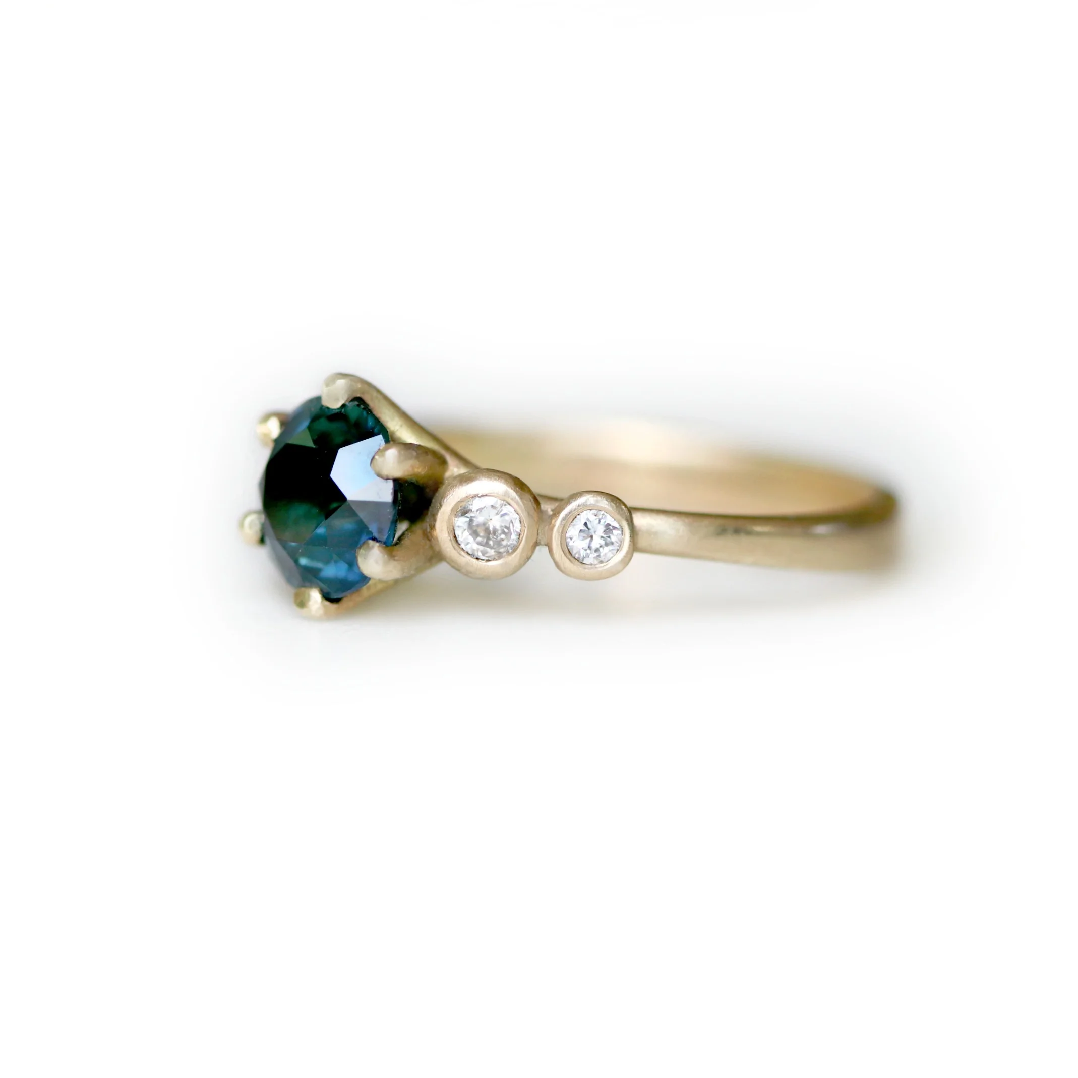 1.2ct_blue_steppingstone_ring_profile_wb.jpg