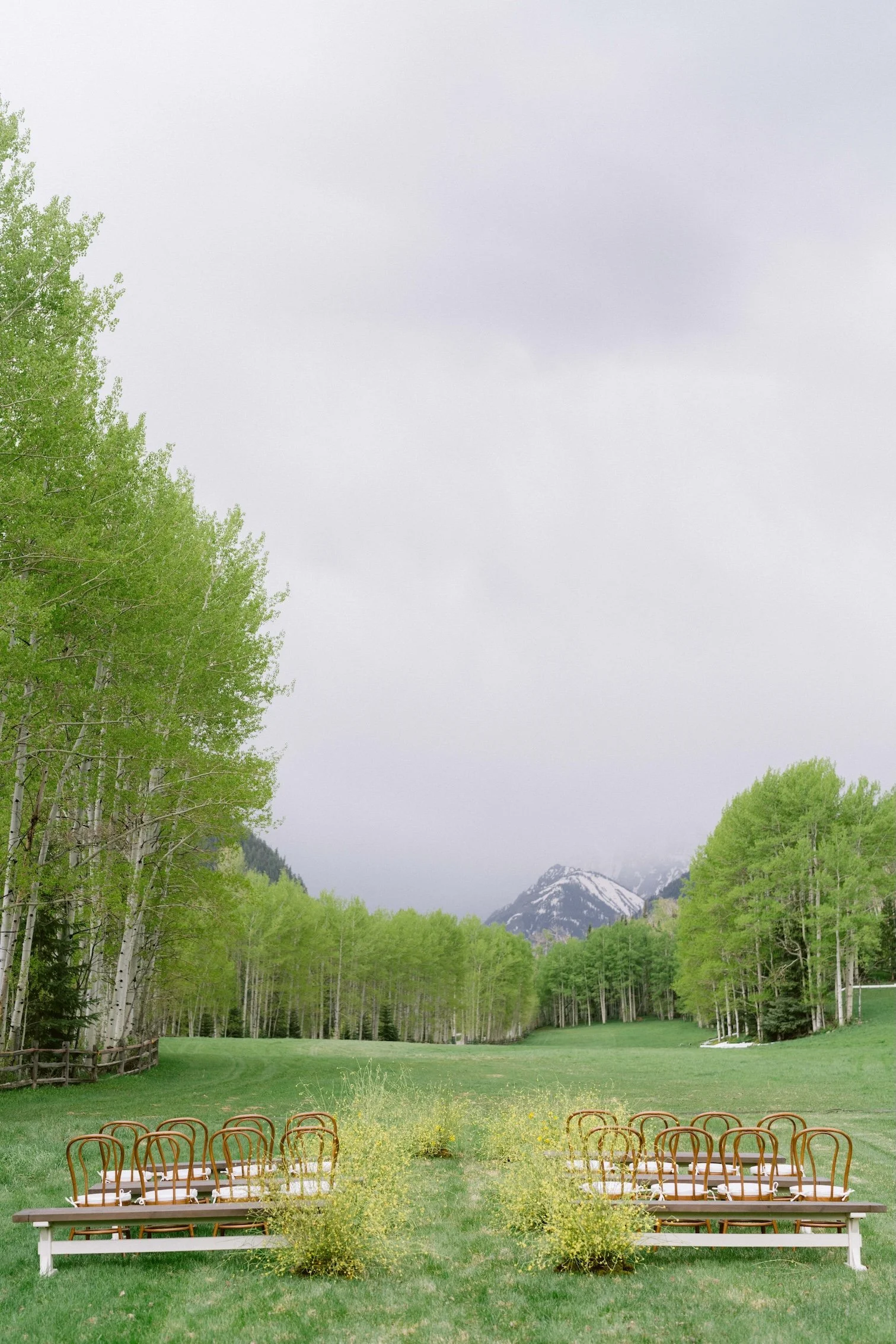 A wedding ceremony set up in the meadow at T Lazy 7 Ranch in Aspen